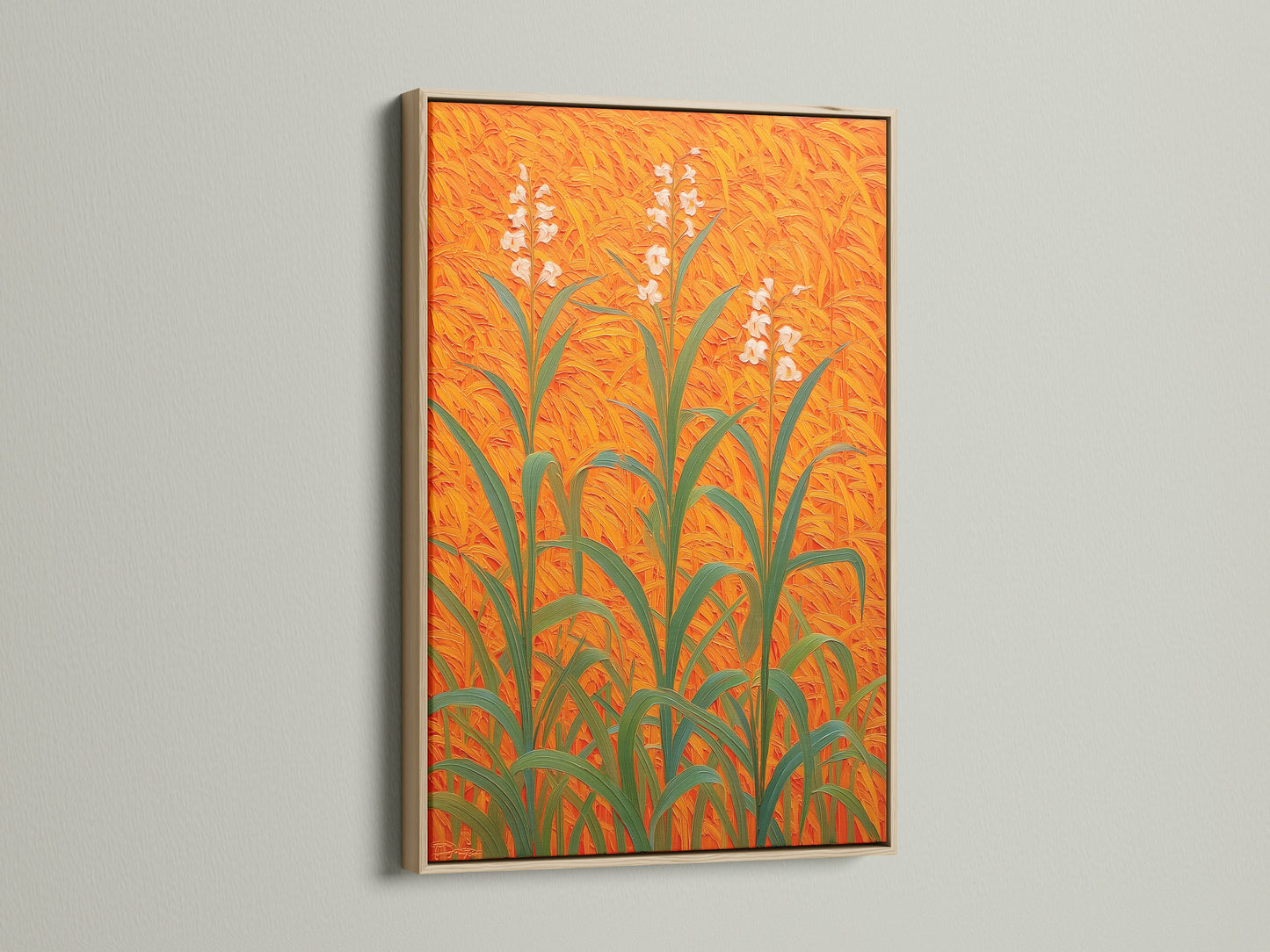 Floral Field Canvas artwork featuring a botanical print with orange wall art in an oak frame. The plant artwork enhances entryway decor. This modern art print adds a touch of nature. A perfect piece of floral wall decor. This field art print on botanical canvas adds an orange home decor element.