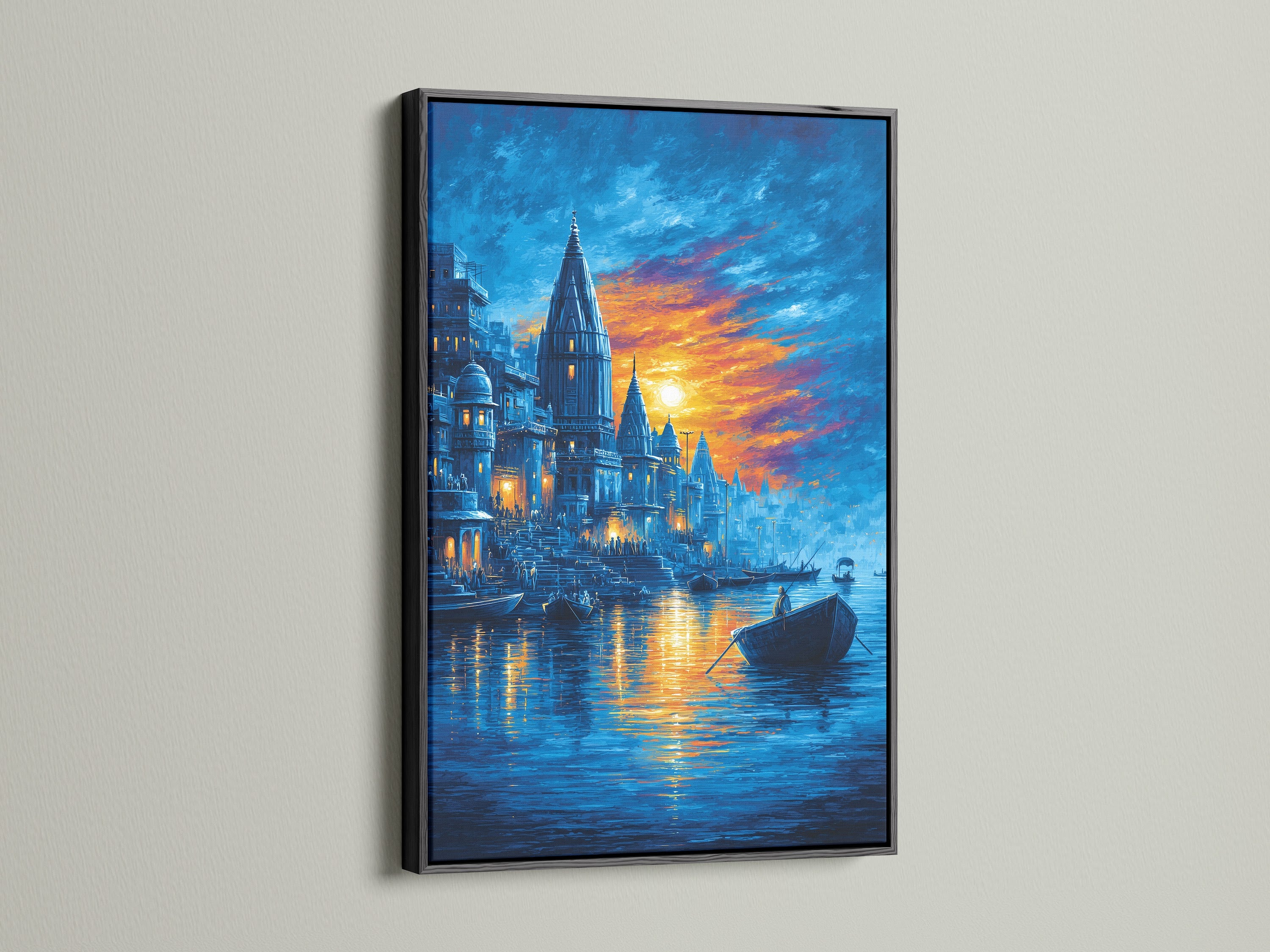 Varanasi Sunset Wall Artwork is strikingly showcased in a black frame. This Indian temple canvas print adds a touch of elegance to your space. The sacred river painting is perfect for meditation rooms. The contrast of the black frame accentuates the blue and orange hues. It is ideal for creating a focal point.