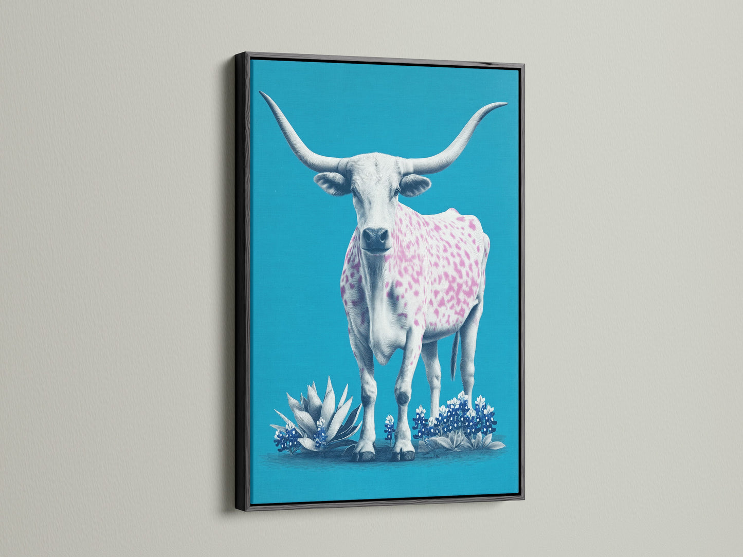 A longhorn cow artwork showcased in a black frame. The artwork features a turquoise background. A cow with pink spots stands out. The black frame adds a bold contrast. This piece is perfect for a sophisticated western theme.