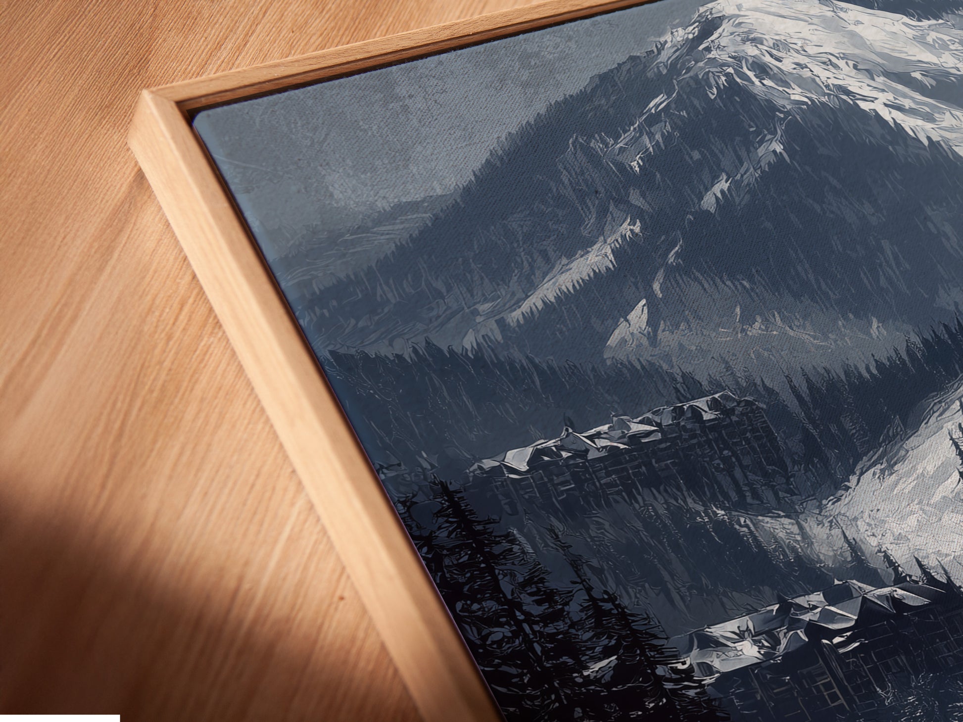 Angled close up of a canvas print in a floating frame. Showcasing a beautiful mountain canvas. The alpine winter landscape brings a touch of the ski resort to your walls. Perfect for cabin decor and winter wall art.