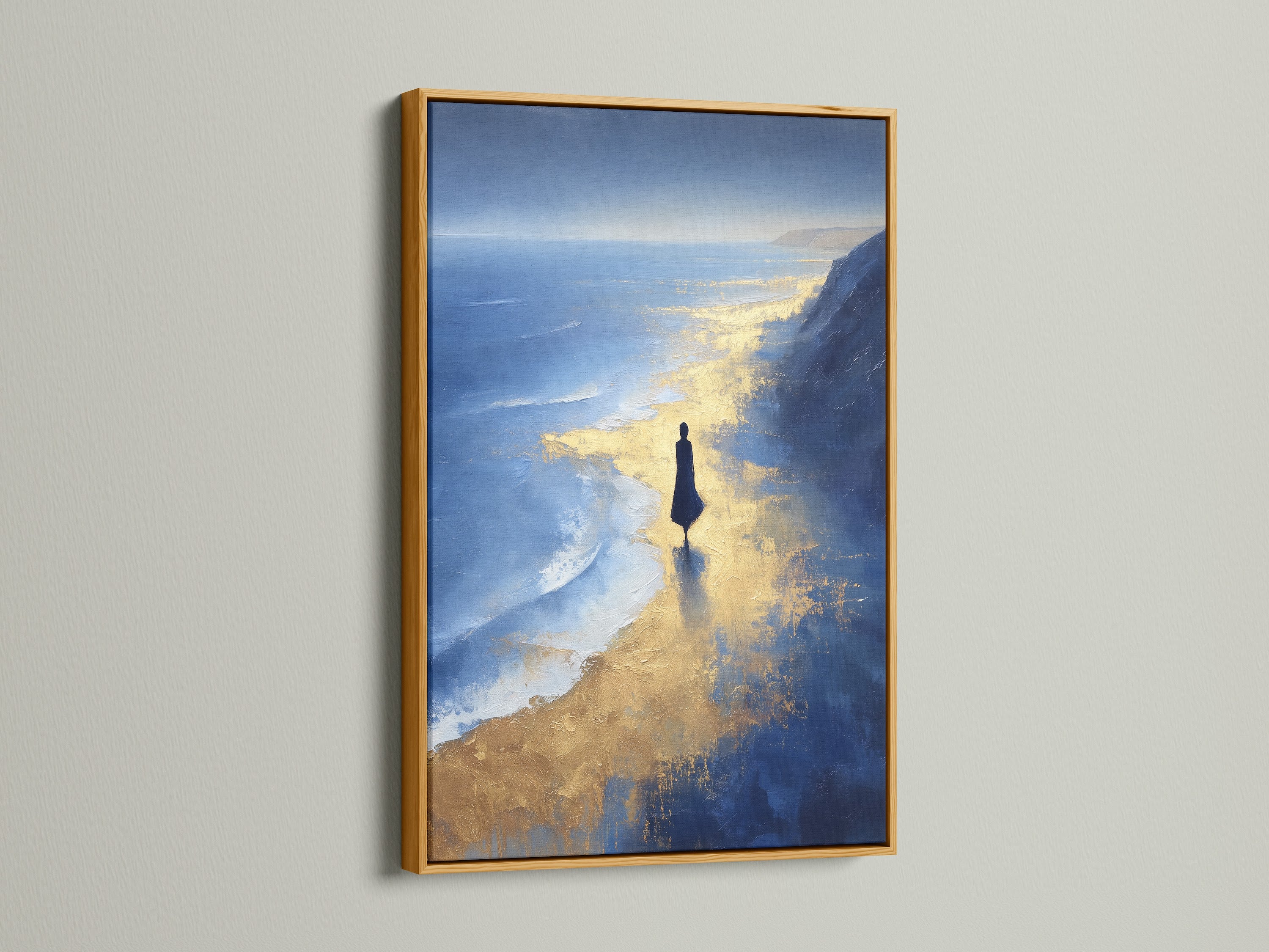 The Ocean Reflection artwork features a gold frame. The metallic accent complements the blue and gold abstract elements. This piece is stunning coastal canvas art. A perfect addition to elevate your living room wall art. Bring a touch of seaside to your home.
