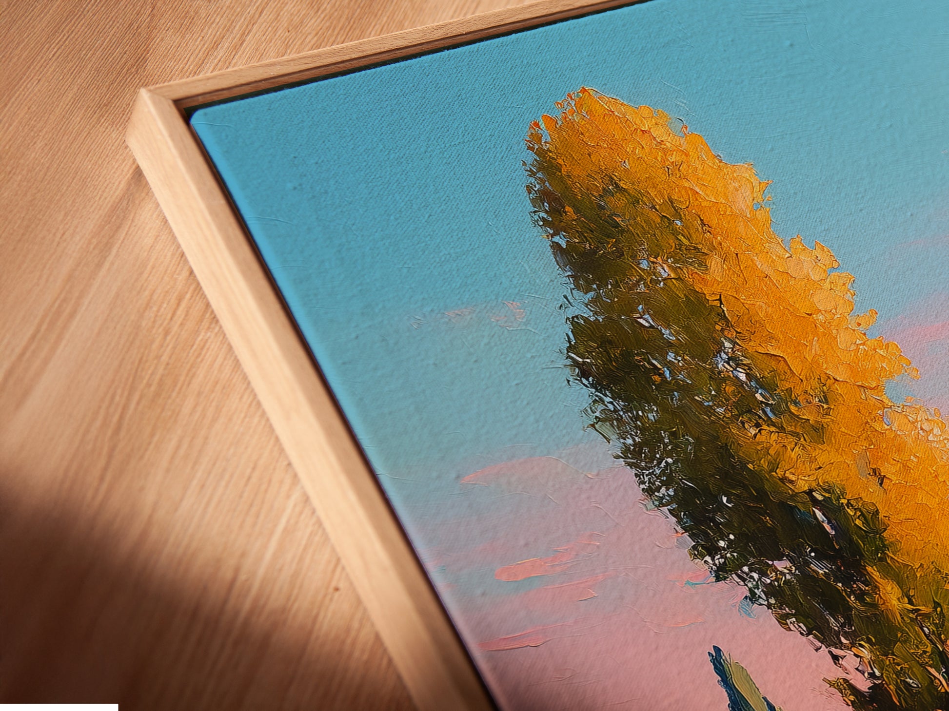 Close-up of a canvas print in a floating frame. The Tuscany Landscape artwork features golden poplar trees. This country path print adds a touch of elegance. Ideal for living room wall art and office wall art.