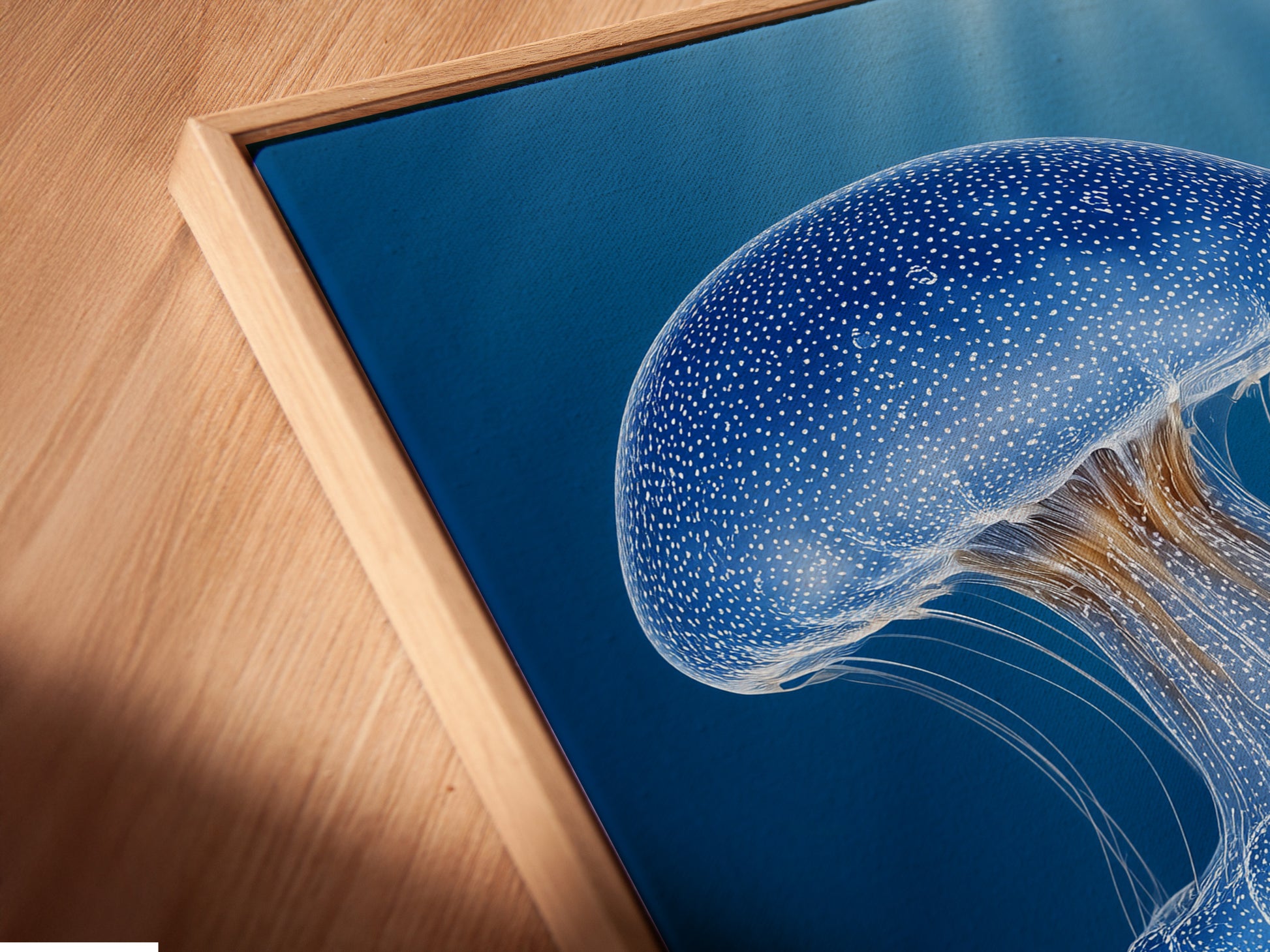 Close-up angled view of a canvas print in a floating frame. The frame creates a unique separation between the canvas and the wall. This enhances the artwork. The floating effect adds depth and dimension. This frameless look offers a modern and sophisticated aesthetic.