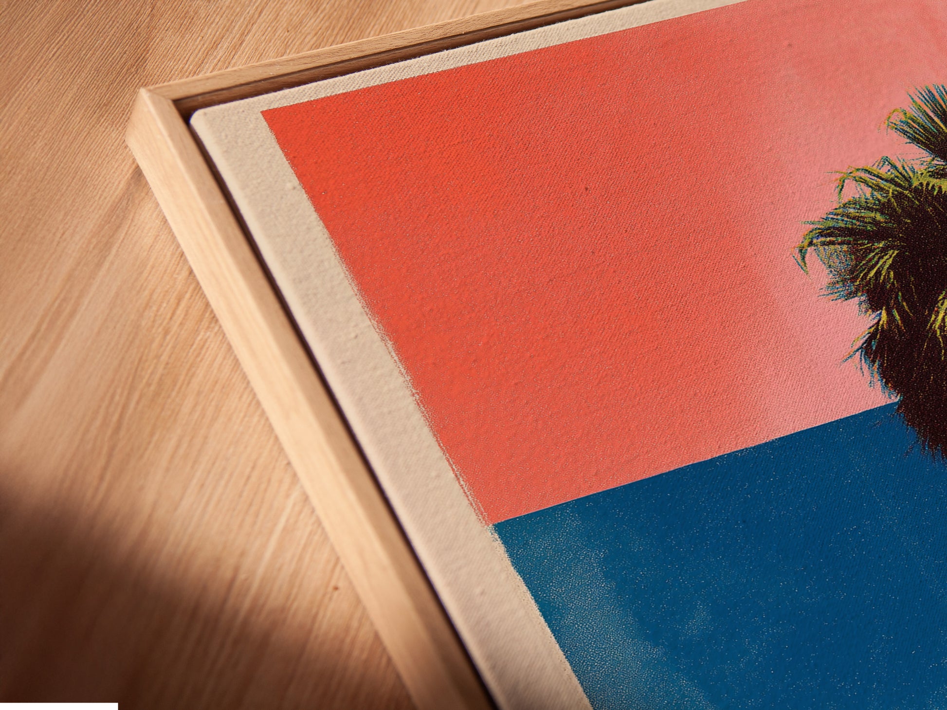 Angled close-up of a canvas print in a floating frame. A modern and minimalist frame. It gives the illusion of floating artwork. This frame style adds depth and dimension. Perfect for contemporary interiors. Discover the beauty of framed artwork.