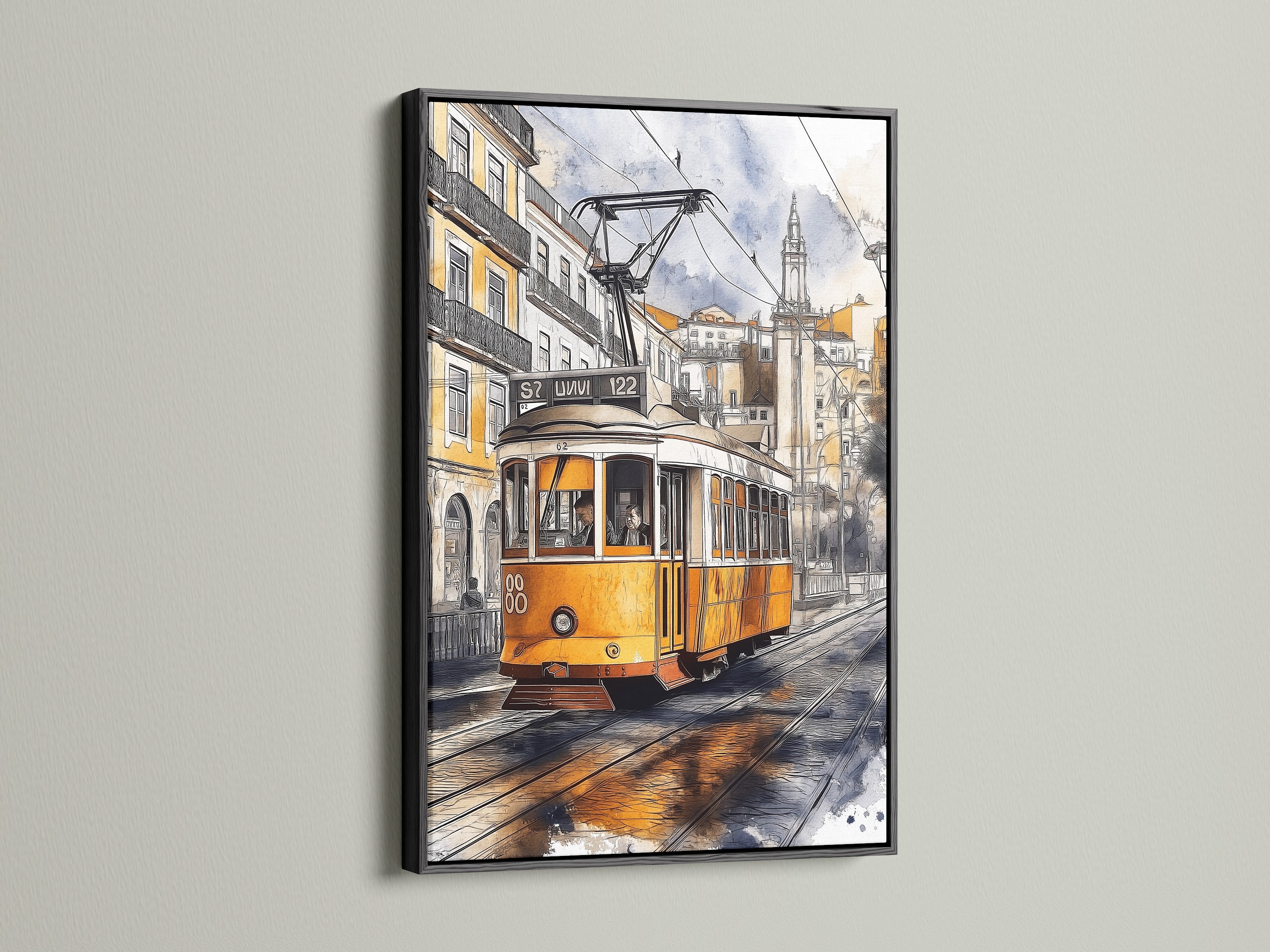 Vintage tram art set against a Lisbon street scene displayed in a black frame. The black frame provides a bold contrast to the yellow tram. This European city art makes a striking statement in any space. A classic choice for wall decor.
