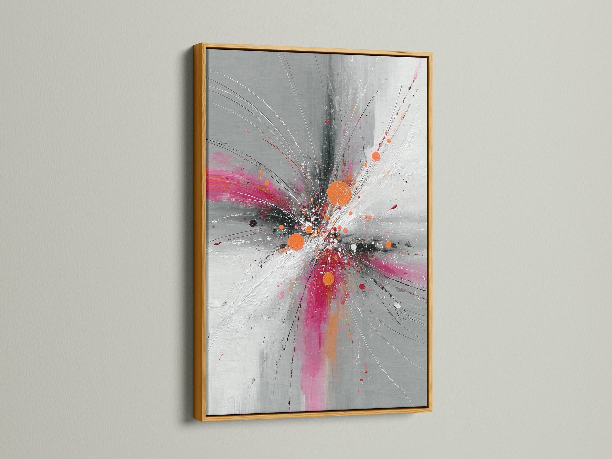 Abstract Burst artwork showcased in a luxurious gold frame. The pink orange and gray colors burst to life in this contemporary artwork. This explosion print adds a touch of glamour to any space. Perfect for elevating your living room or office decor. The gold frame exudes elegance.