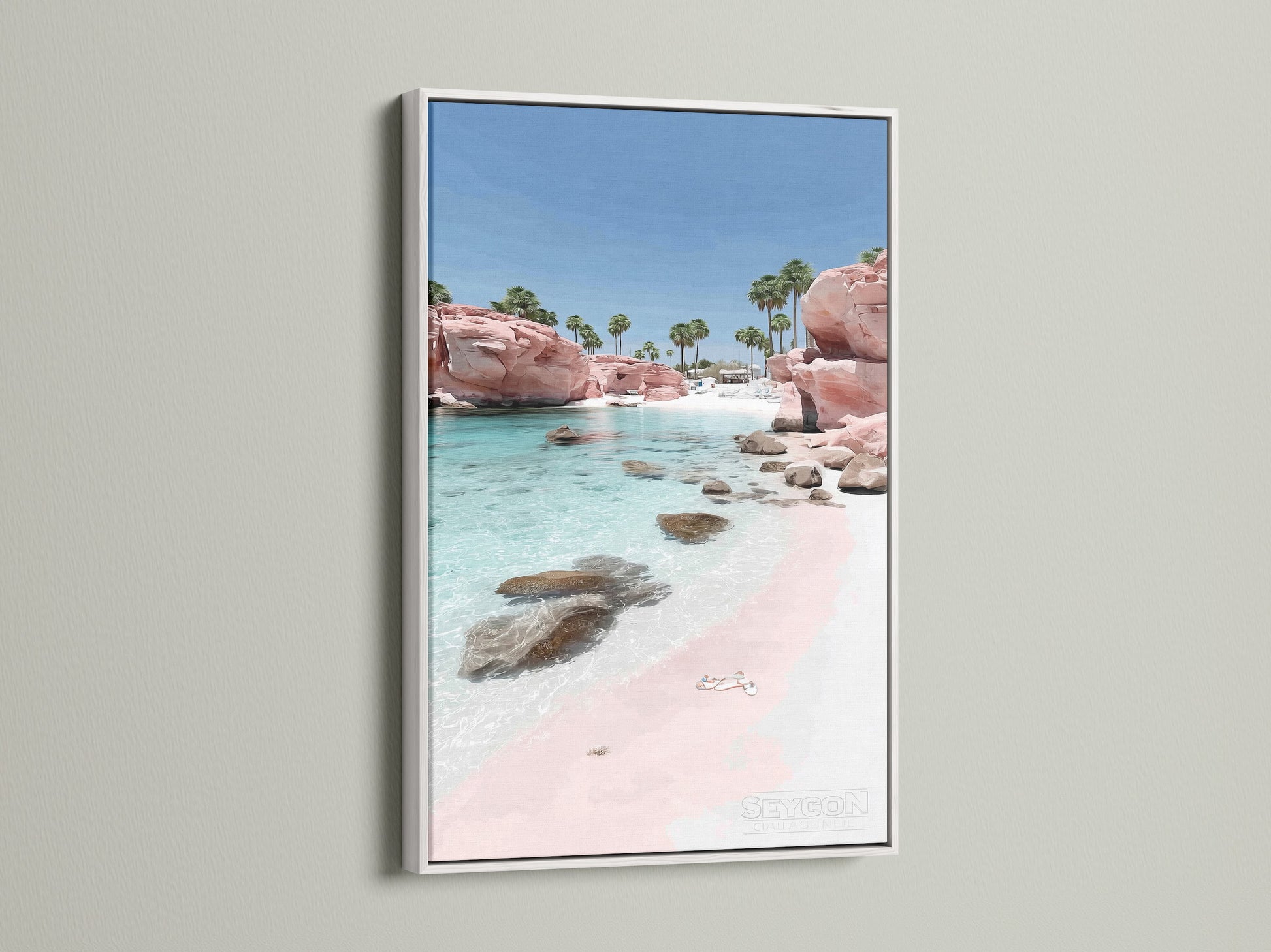 Pink Sand Beach artwork with a white frame. This seascape art adds a fresh coastal touch. The white frame complements the turquoise ocean photography. Perfect beachy wall decor.