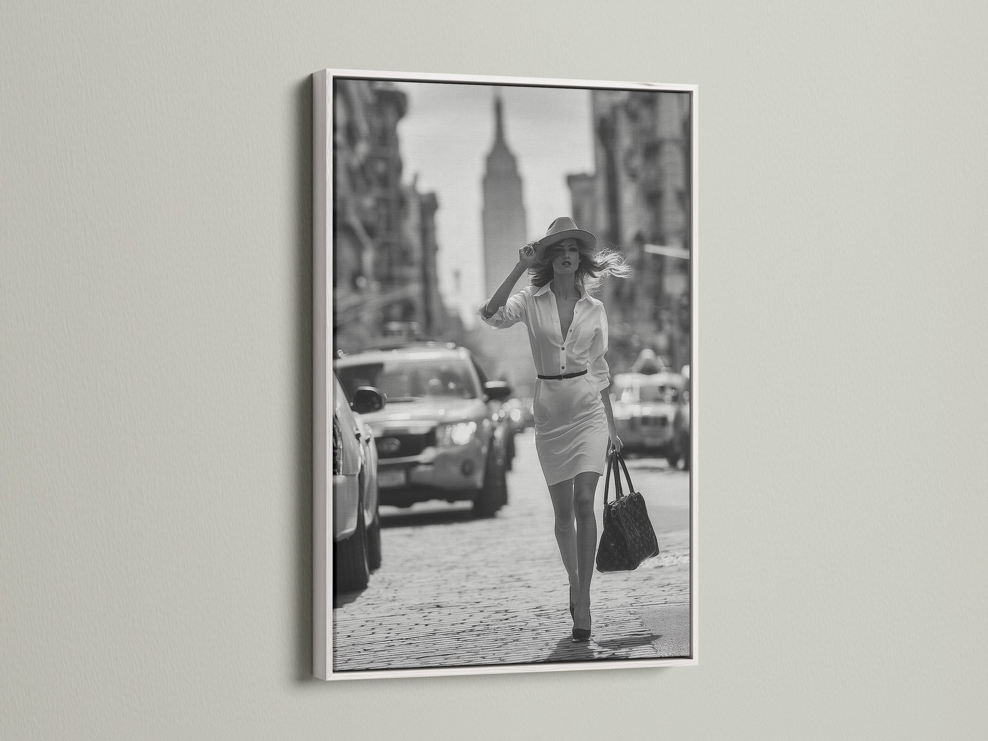 Brighten your walls with a white frame. This frame features a black and white photograph of a woman in a city setting. White frames offer a clean and modern look. Explore our selection to frame your favorite art pieces perfectly.