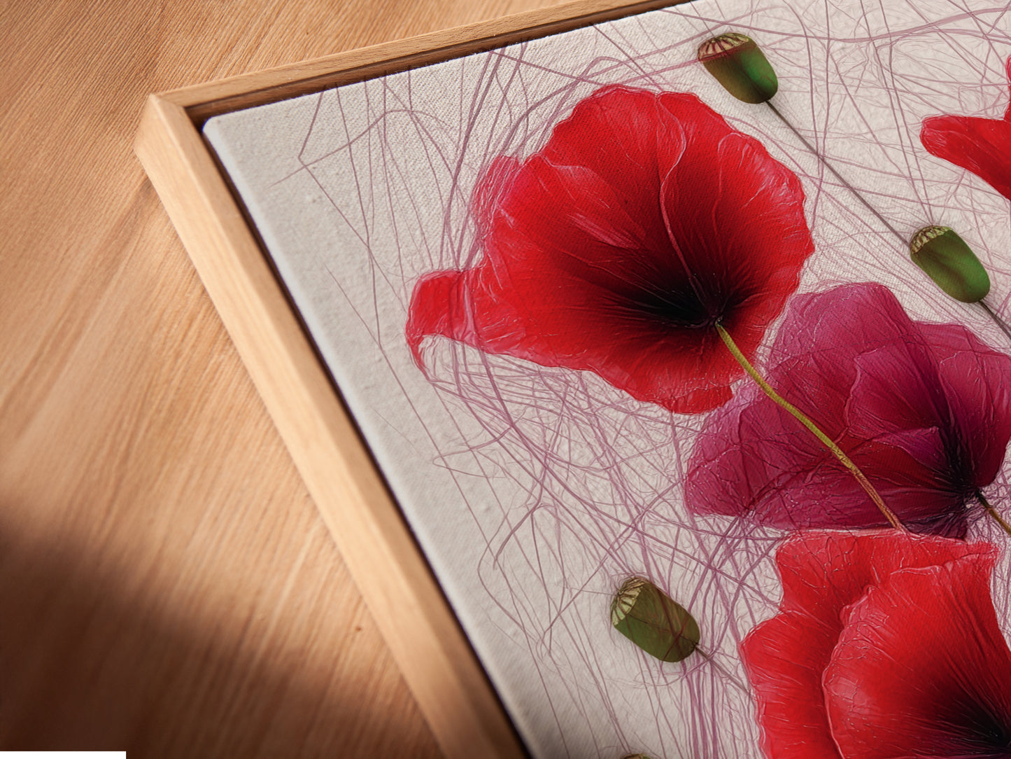 Close-up of a canvas print in a floating frame. The frameless look highlights the botanical artwork. A modern and sleek way to display floral wall art. Ideal for homeowners and interior stylists.