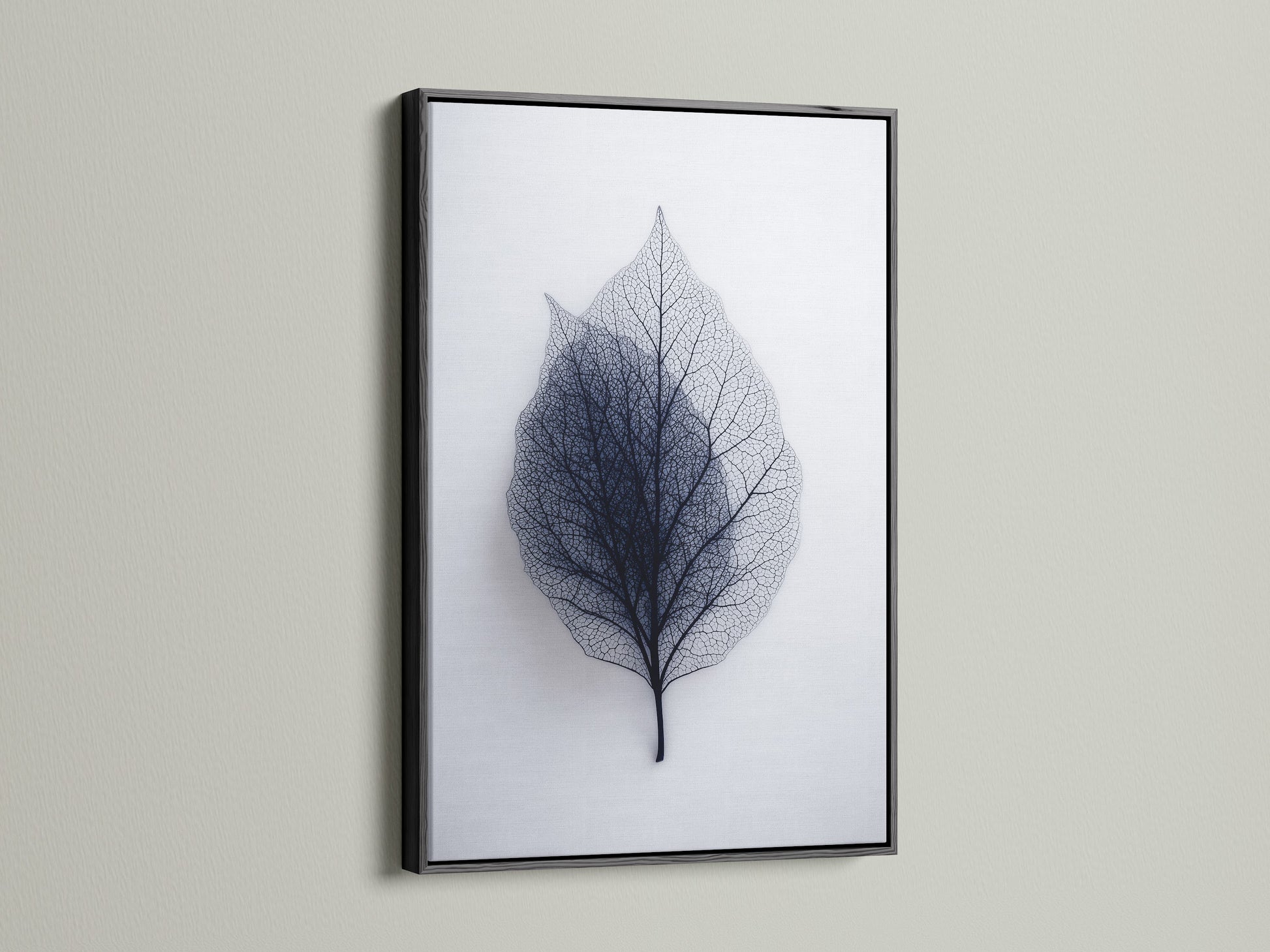 Leaf art displayed in a sleek black frame. The black frame adds a touch of sophistication. It makes a bold statement on any wall. This frame enhances the artwork's contrast. Choose a black frame for a modern gallery feel.