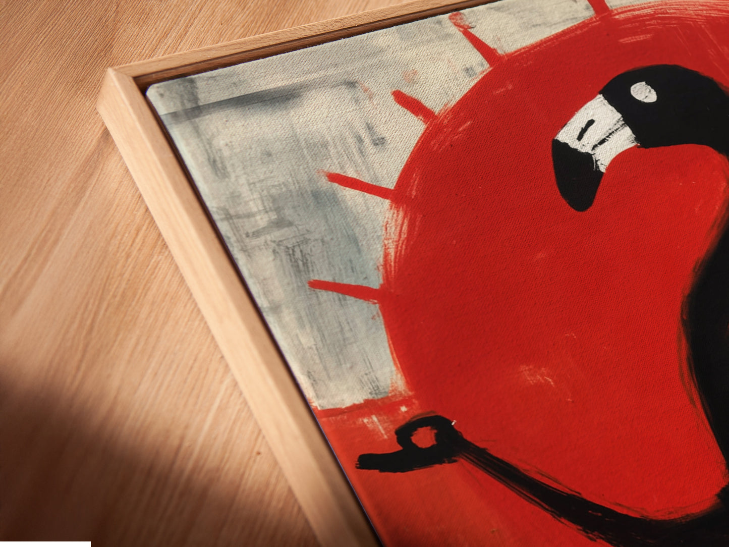 A close-up of a canvas print in a floating frame showcases modern flamingo artwork. The frame creates a unique shadow. The red sun canvas art appears to float. This adds depth and dimension to the bird art. Perfect for contemporary spaces and tropical wall art.