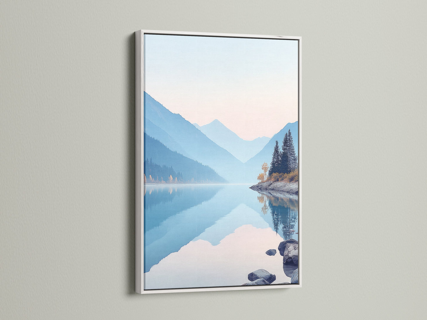 White frame displays mountain lake art. Its pastel shades create a serene landscape. The artwork is perfect for creating a calming bedroom wall decor. The nature canvas print brings a peaceful mountain view. Blue mountain decor enhances minimalist spaces. It complements wellness centers.