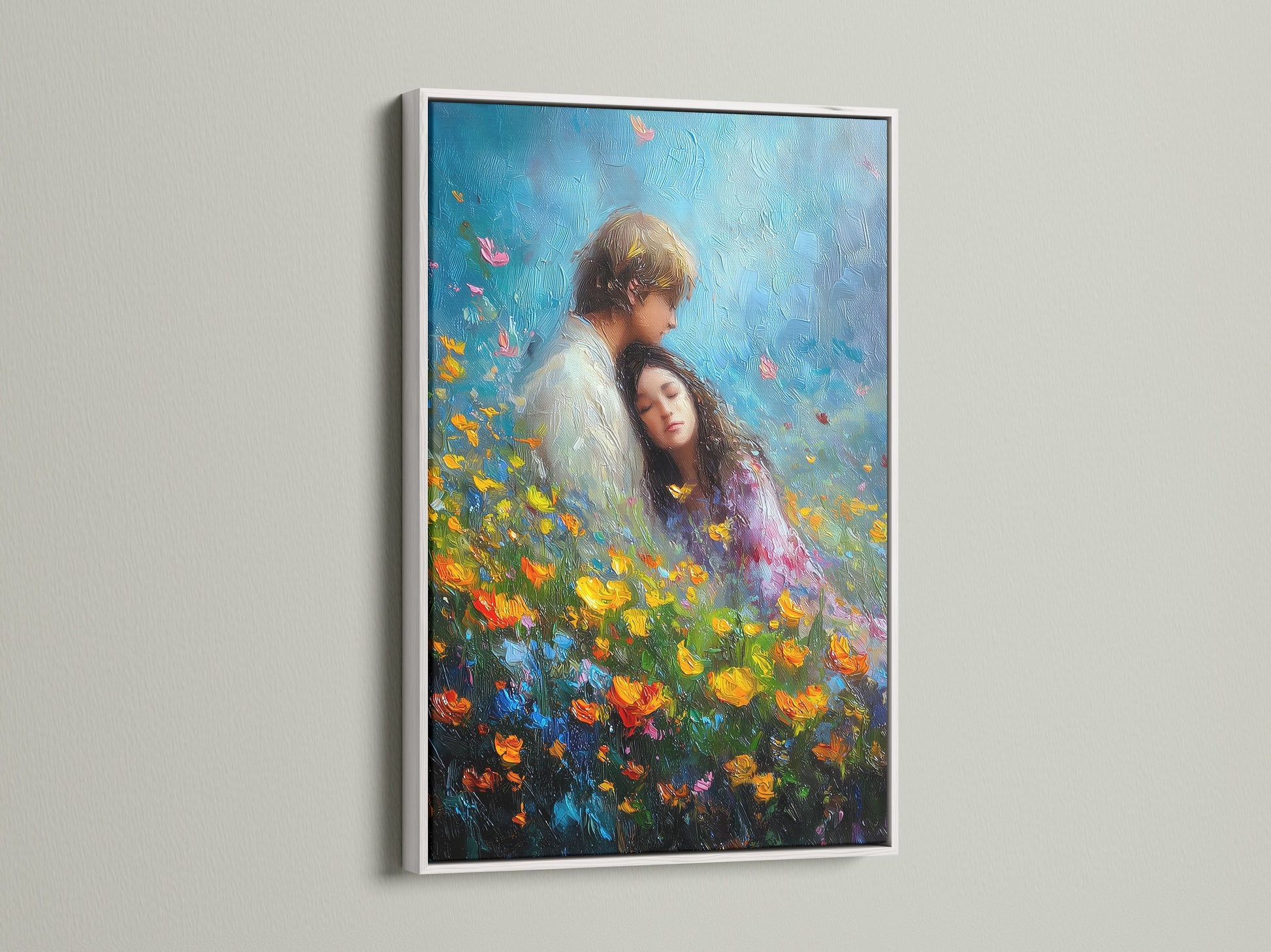 Artwork featuring a white frame. The art captures a couple embraced in a field of flowers. The white frame offers a clean modern look. It allows the colorful artwork to stand out. A versatile choice for any room.