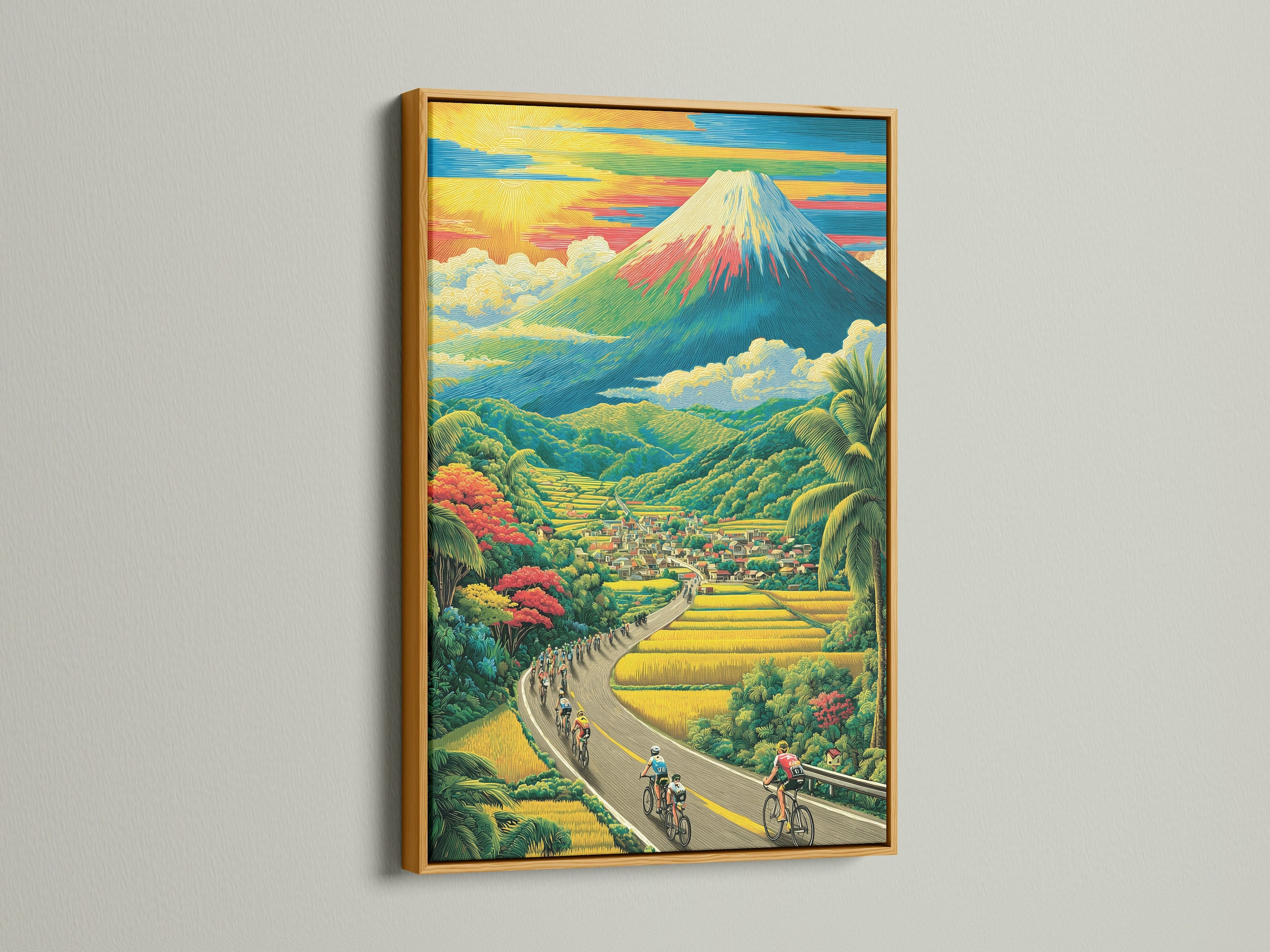 A landscape artwork is highlighted with a gold frame. The image captures cyclists riding along a road. A village and stunning mountain are visible. The gold frame enhances the artwork's beauty and elegance.