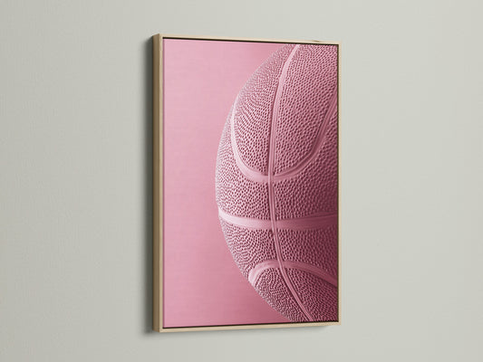 Oak Frame displayed on a wall. This frame enhances a pink basketball art print. The oak frame offers a natural touch. It enhances artwork for a gallery-worthy display. Elevate your space with framed art.