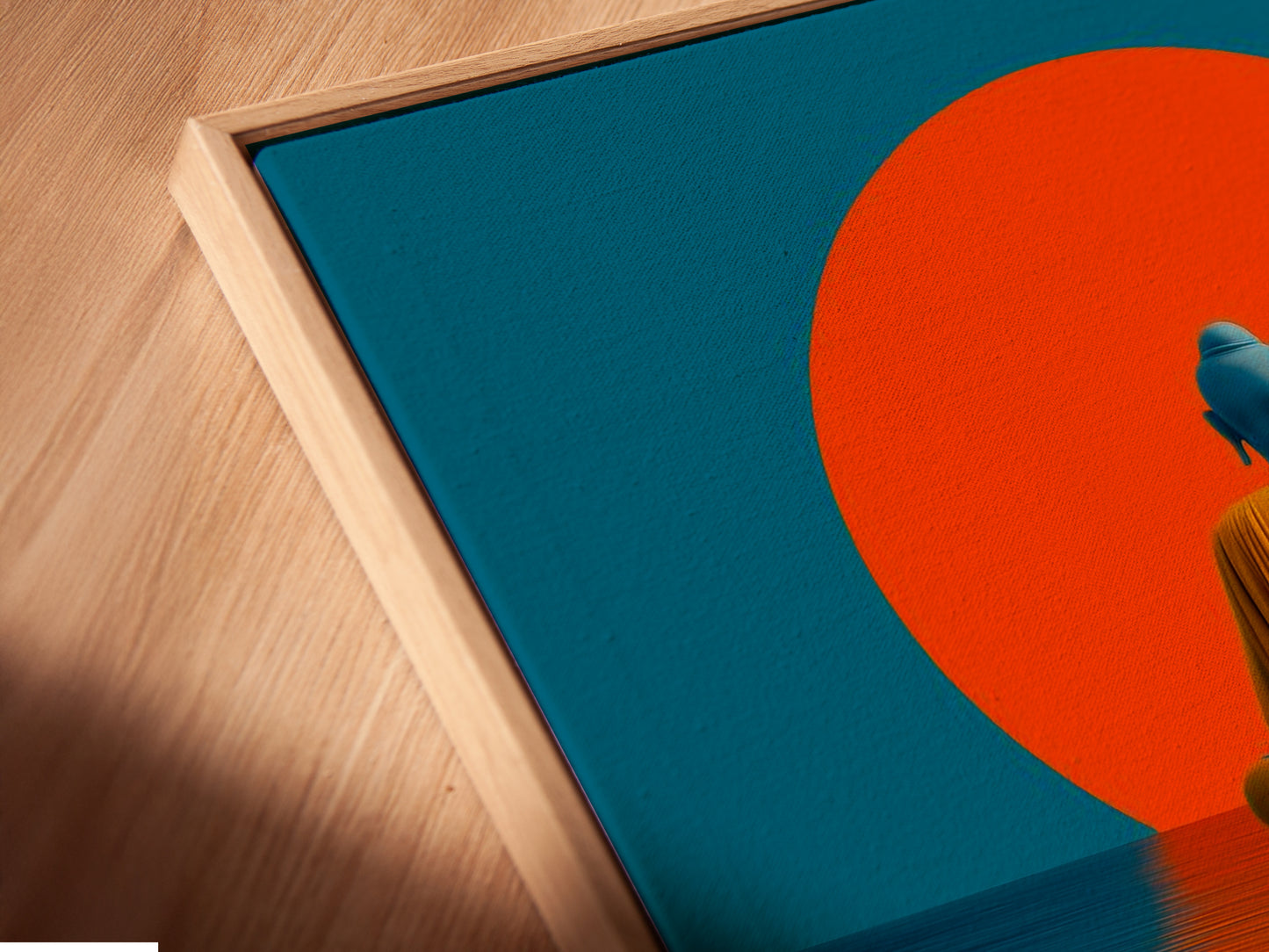 A close-up angle reveals a canvas print of the Buddha artwork in a floating frame. The teal and orange colors create a calming effect. This modern wall art is perfect for adding a spiritual touch. It is ideal for yoga studios living rooms and meditation spaces.