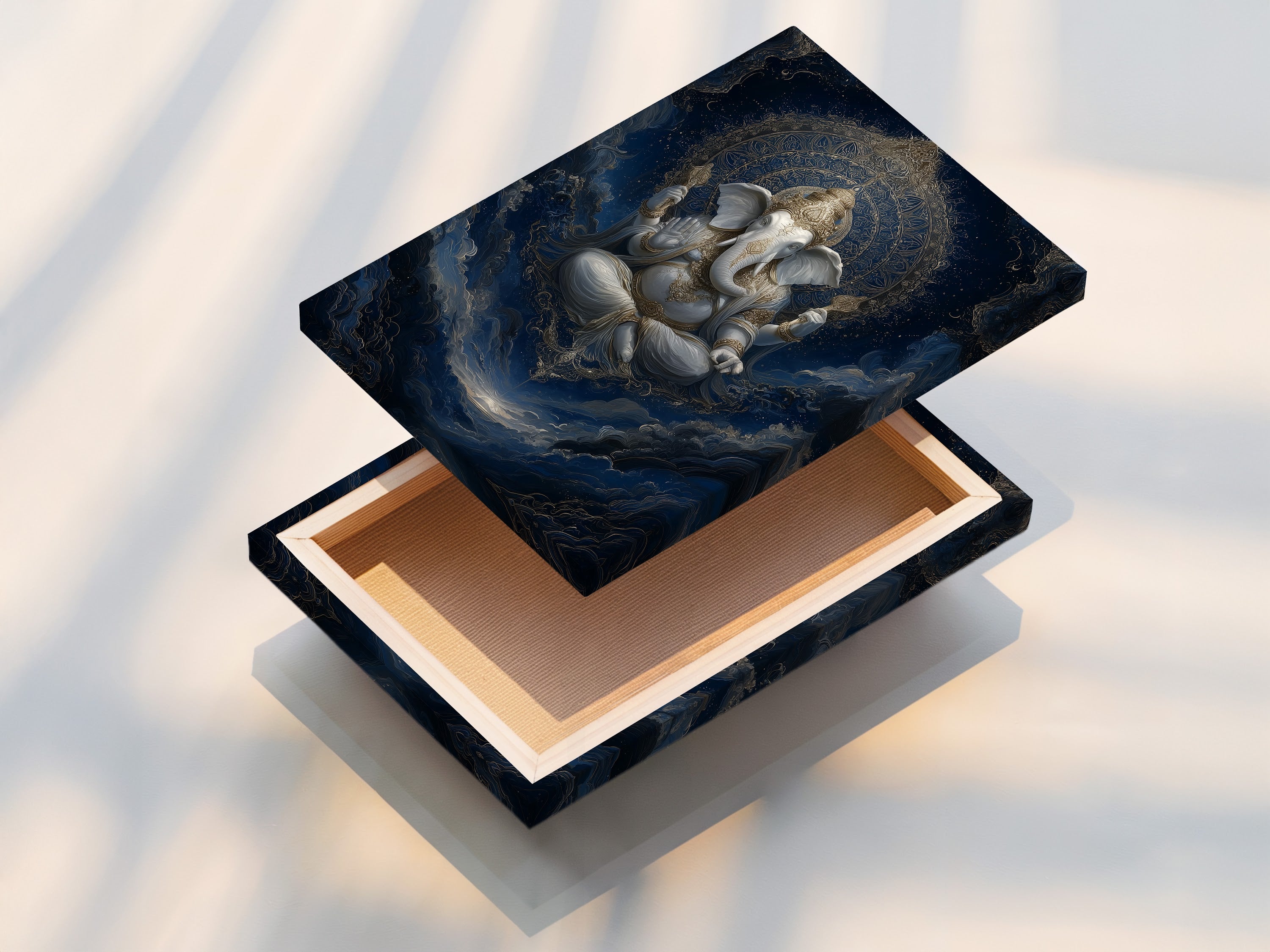 Stretched canvas print of Ganesha. The Hindu God wall art is ready to hang. The spiritual canvas adds an elevated touch to any space. Perfect for bohemian minimalist or eclectic styles.