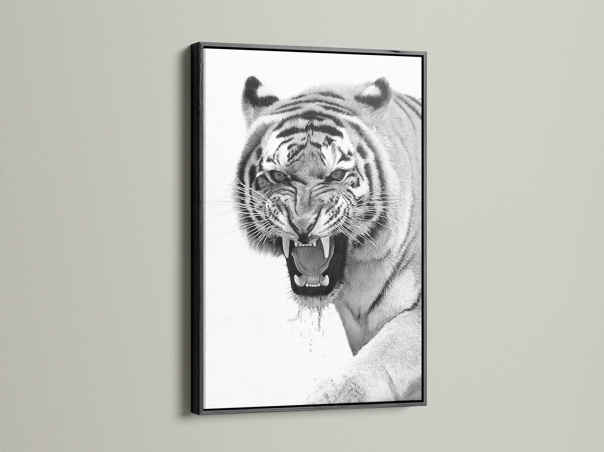 This is a bold tiger artwork set in a sleek black frame. The black frame adds a touch of drama to the artwork. The art piece is perfect for a modern or minimalist space. It brings sophistication and style to any room. The black frame enhances the artwork.