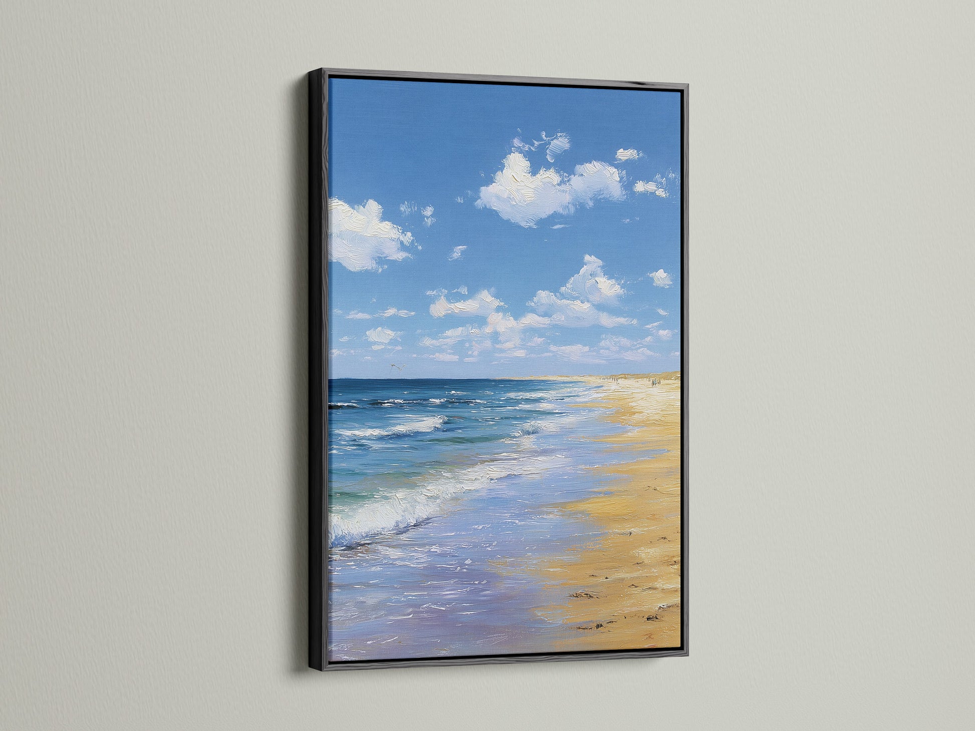 Artwork in a black frame. The artwork depicts a beach scene. The art is hanging on a white wall. The black frame provides a bold contrast. This artwork adds a stylish touch to any room.