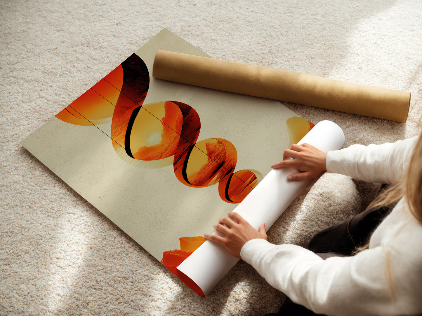 A woman is carefully rolling a fine art poster paper. The paper features abstract geometric artwork with orange and red hues. High quality printing ensures vibrant colors. Perfect for those seeking elevated abstract art. This poster adds a contemporary touch to any space. Ideal for modern minimalist and Scandinavian interiors. Enhance your home today.