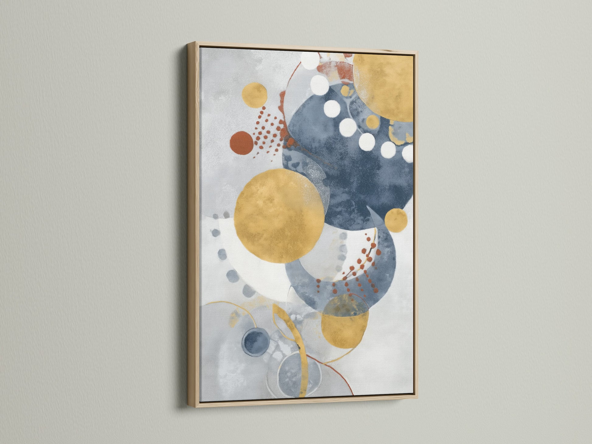 Modern geometric wall art in an oak frame enhances any room. The abstract artwork features blue and gold circles. This contemporary watercolor print adds style to your living room or office.