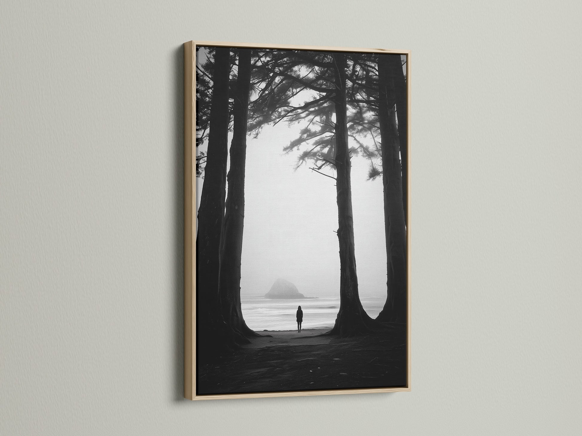 Framed artwork of a black and white beach scene. The print is surrounded by an oak frame. The oak frame enhances the artwork. It brings warmth and natural beauty to the space. Discover the appeal of oak framed art.