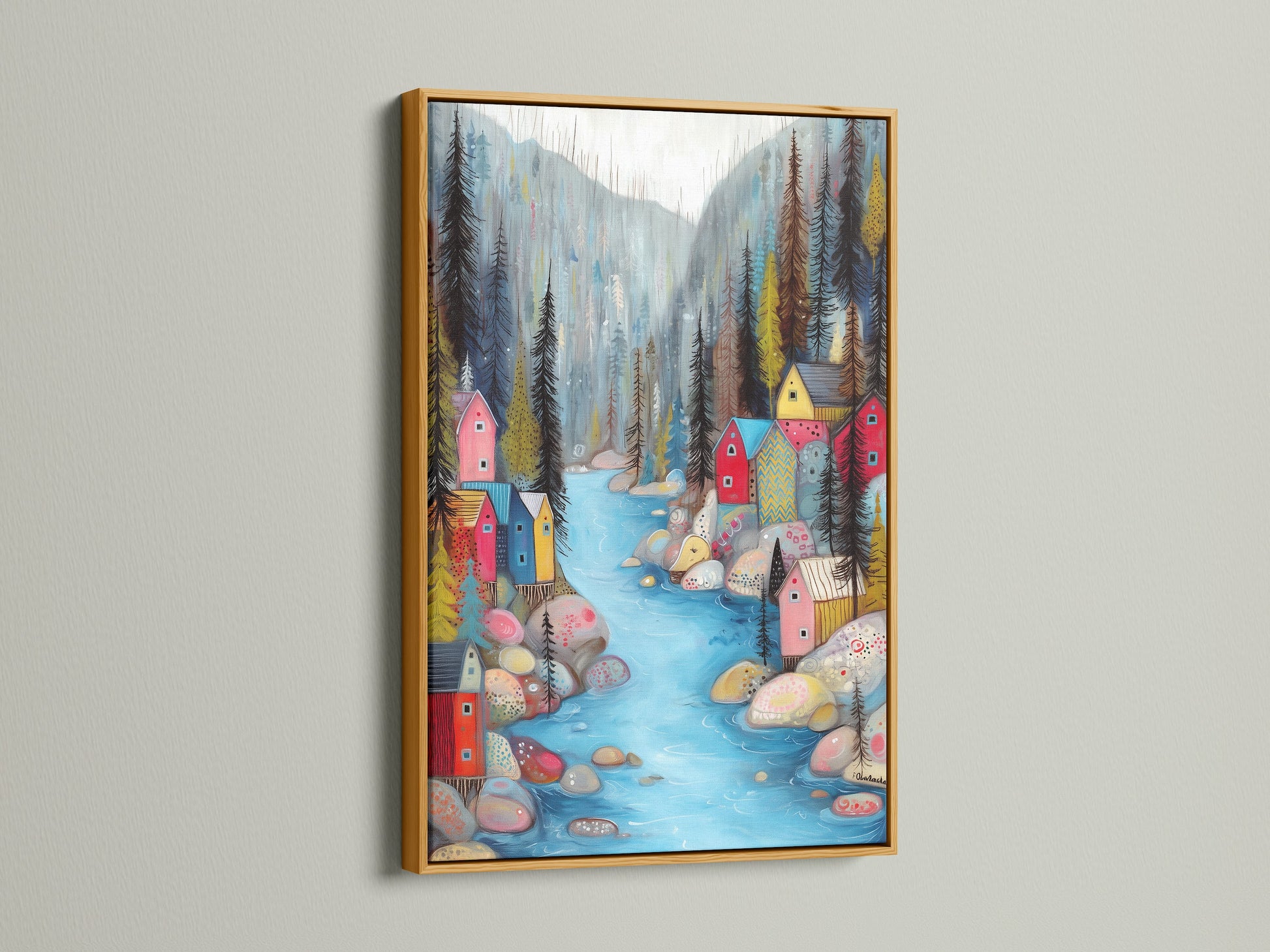Village River colorful art in a gold frame. The gold frame adds a touch of elegance and luxury. The whimsical decor shines with the gold accent. It brings a warm and sophisticated feel to your home. This piece is ideal for adding a touch of glamor to your living room.