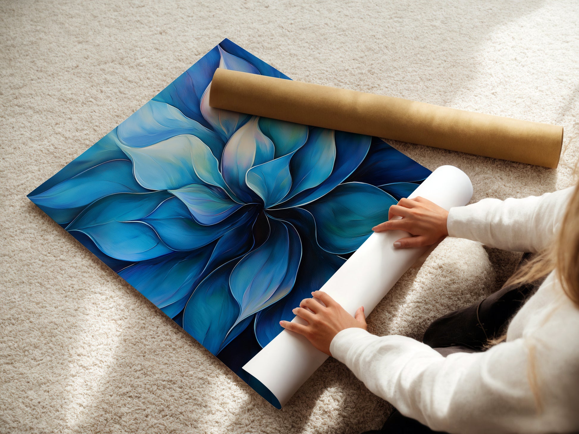 A woman is carefully rolling a fine art poster paper. The paper showcases a blue flower artwork. This highlights the care in preparing fine art prints. The poster paper is ideal for detailed botanical prints. It is perfect for homeowners seeking high-quality wall art that adds a touch of elegance.