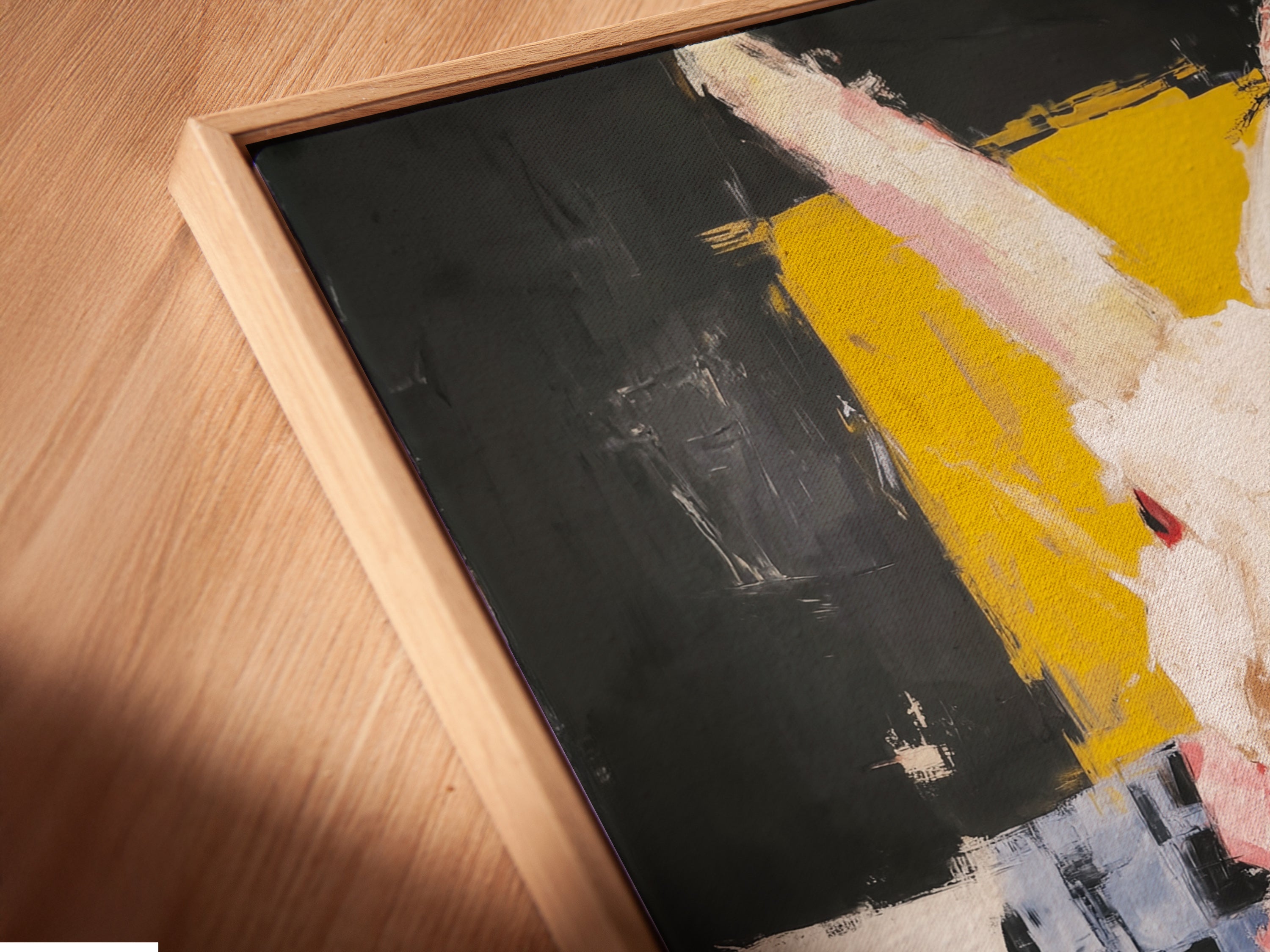 A close-up angled view showcases the canvas print of the rabbit pianist in a floating frame. The floating frame gives the artwork a modern touch. This whimsical animal art piece is perfect for contemporary decor. The abstract music wall art adds a playful charm. Ideal for office wall decor.