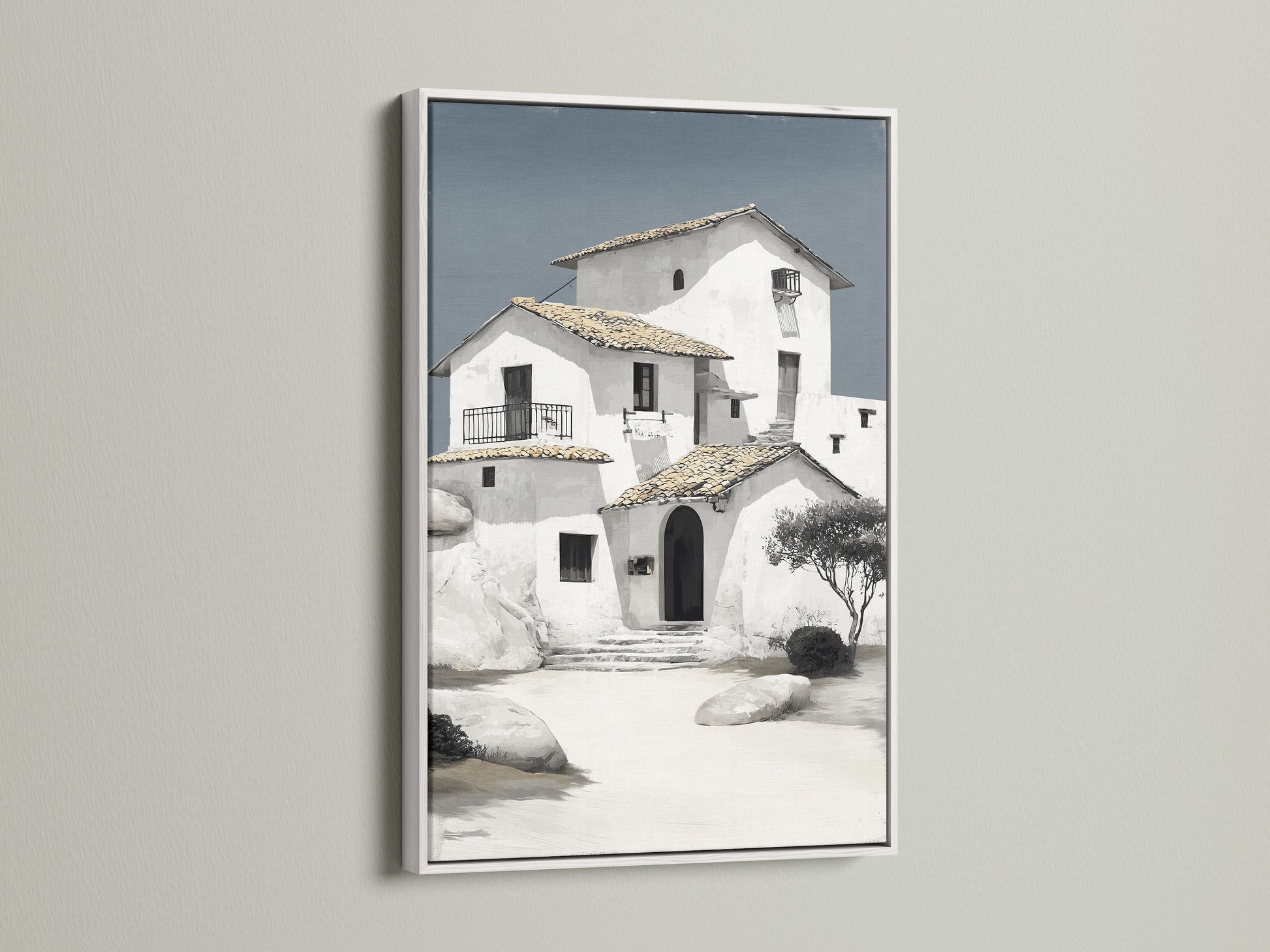 Coastal architecture wall art displayed in a white frame. This minimalist white building art brings a touch of Mediterranean style to your home. Ideal for neutral wall art settings. Discover the beauty of our house artwork. Shop now for your perfect piece.