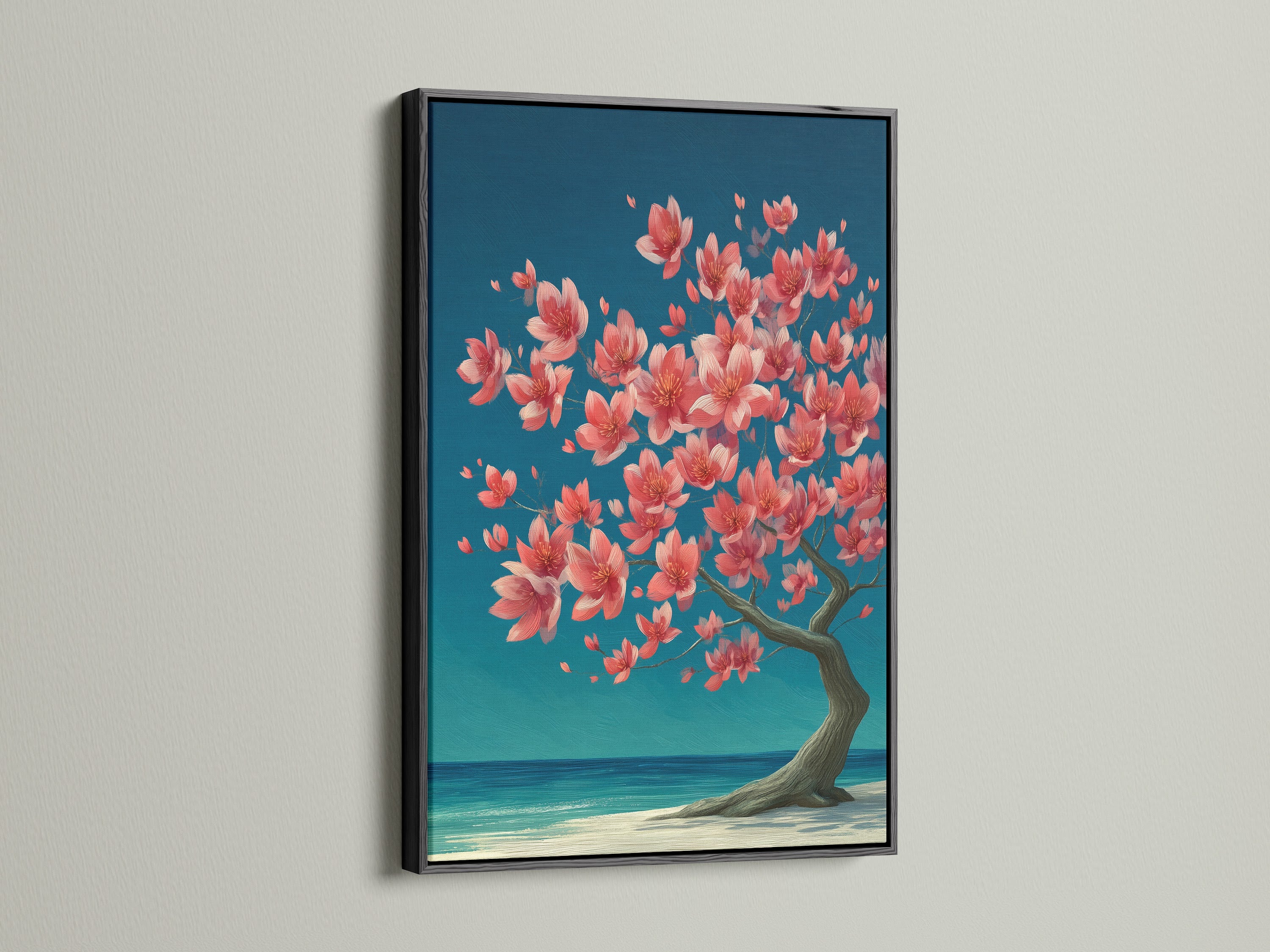 A black frame enhances the cherry blossom tree artwork. The dark frame makes the colors pop. This artwork features coral pink florals and teal ocean hues. The art is ideal for modern spaces.
