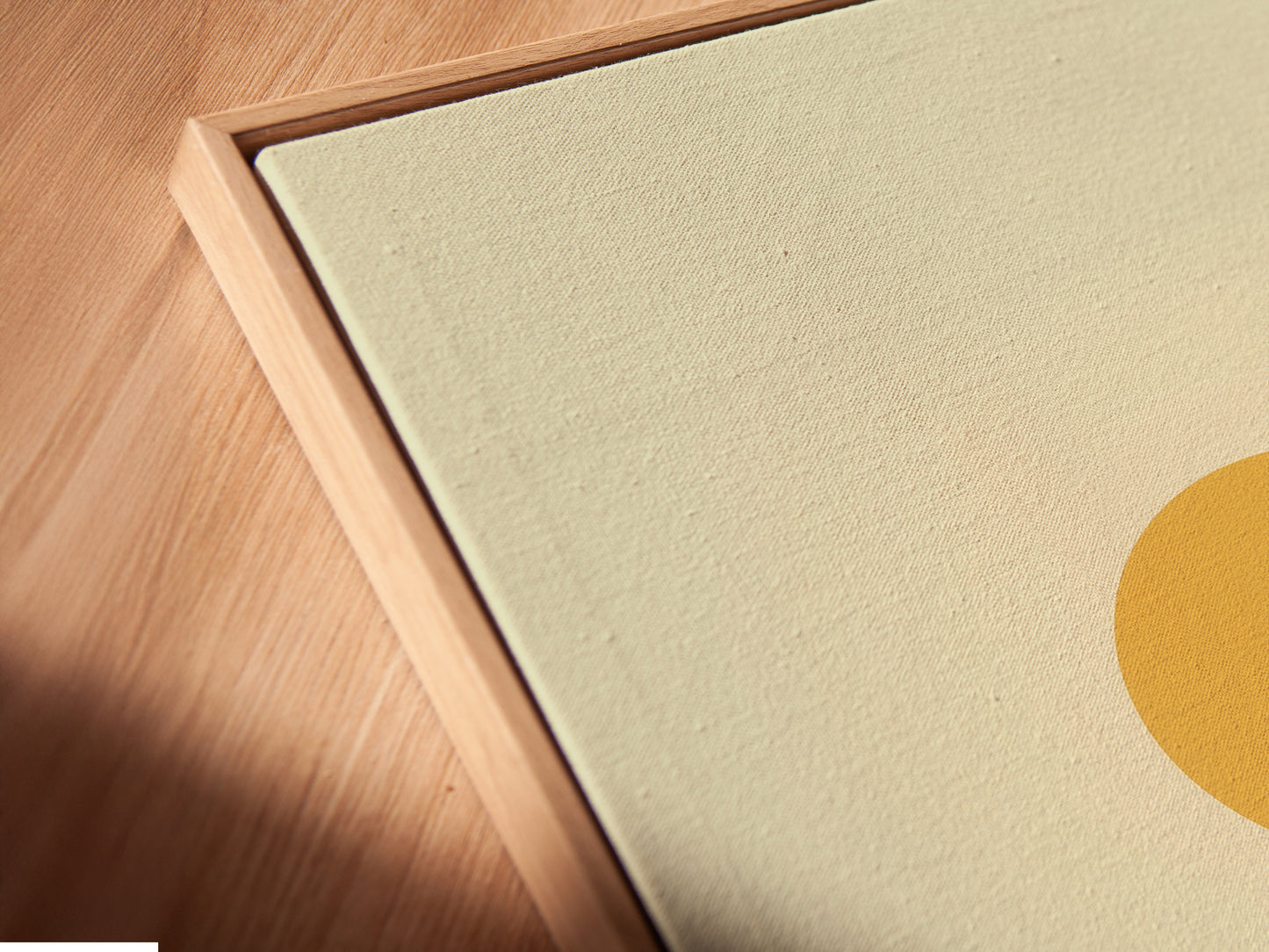 A close-up angle showcases a canvas print. The floating frame adds depth to the desert landscape artwork. The warm earth tones complement any decor. It is minimalist wall art. This print brings southwestern decor to a home or office.