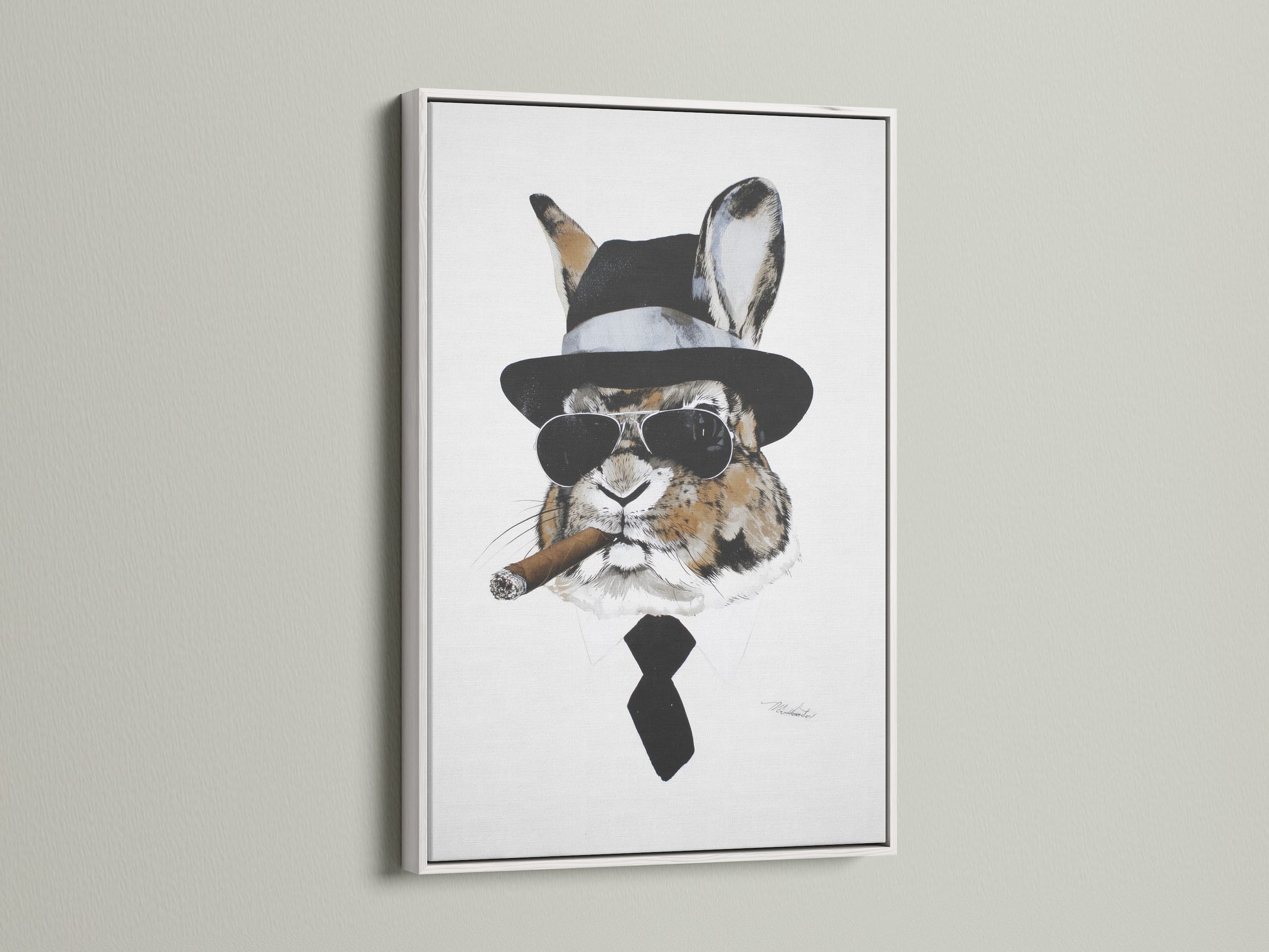 Gentleman Rabbit artwork in a white frame. This whimsical wall decor is perfect for any space. The white frame offers a clean modern look. It's a great choice for contemporary interiors. This bunny canvas print brings character to your walls.