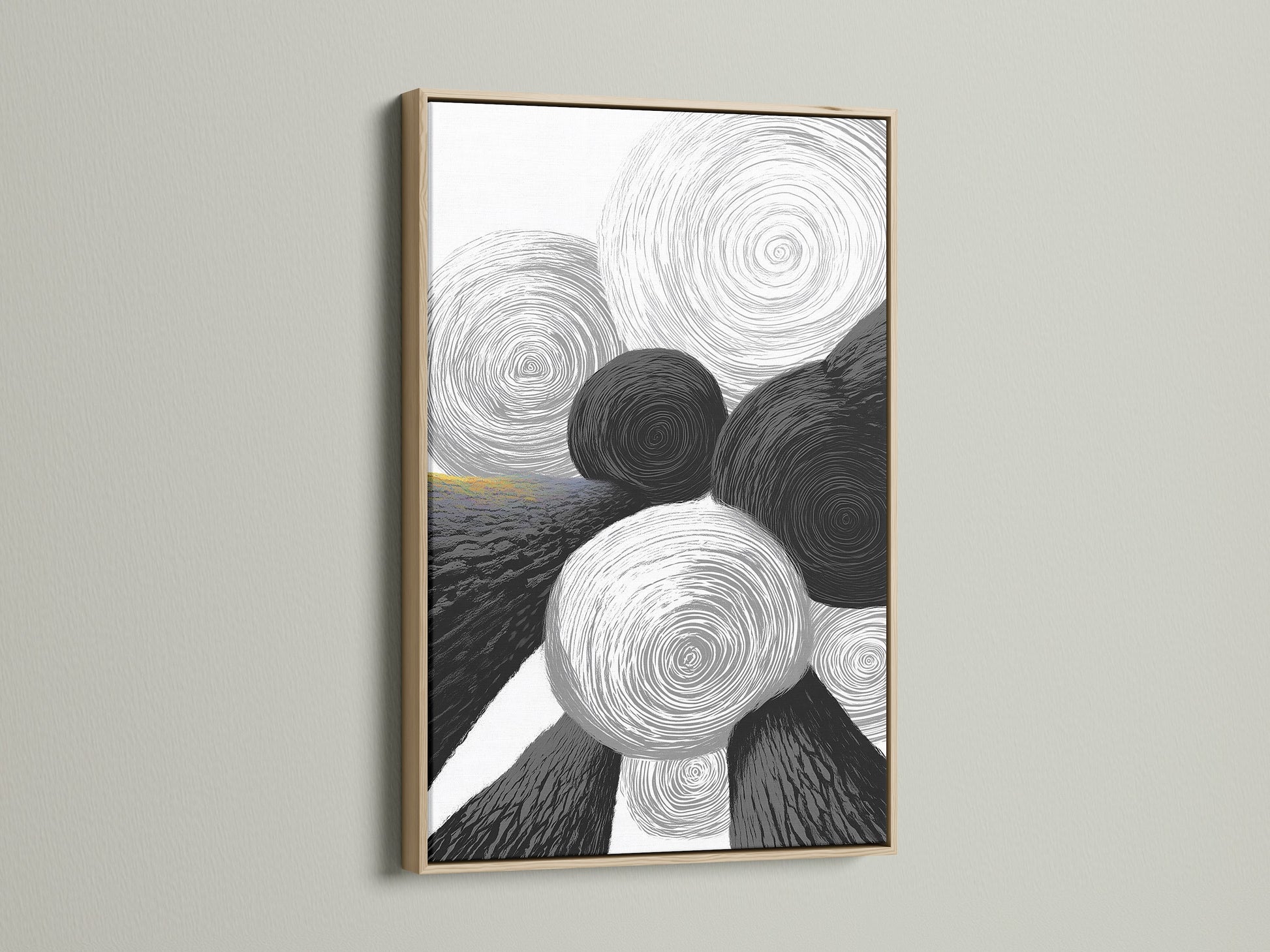 A framed abstract geometric art print. The artwork features black and white circles. The frame is crafted from oak wood. This piece adds a touch of modern minimalist charm to any space. Perfect for living rooms offices or bedrooms.