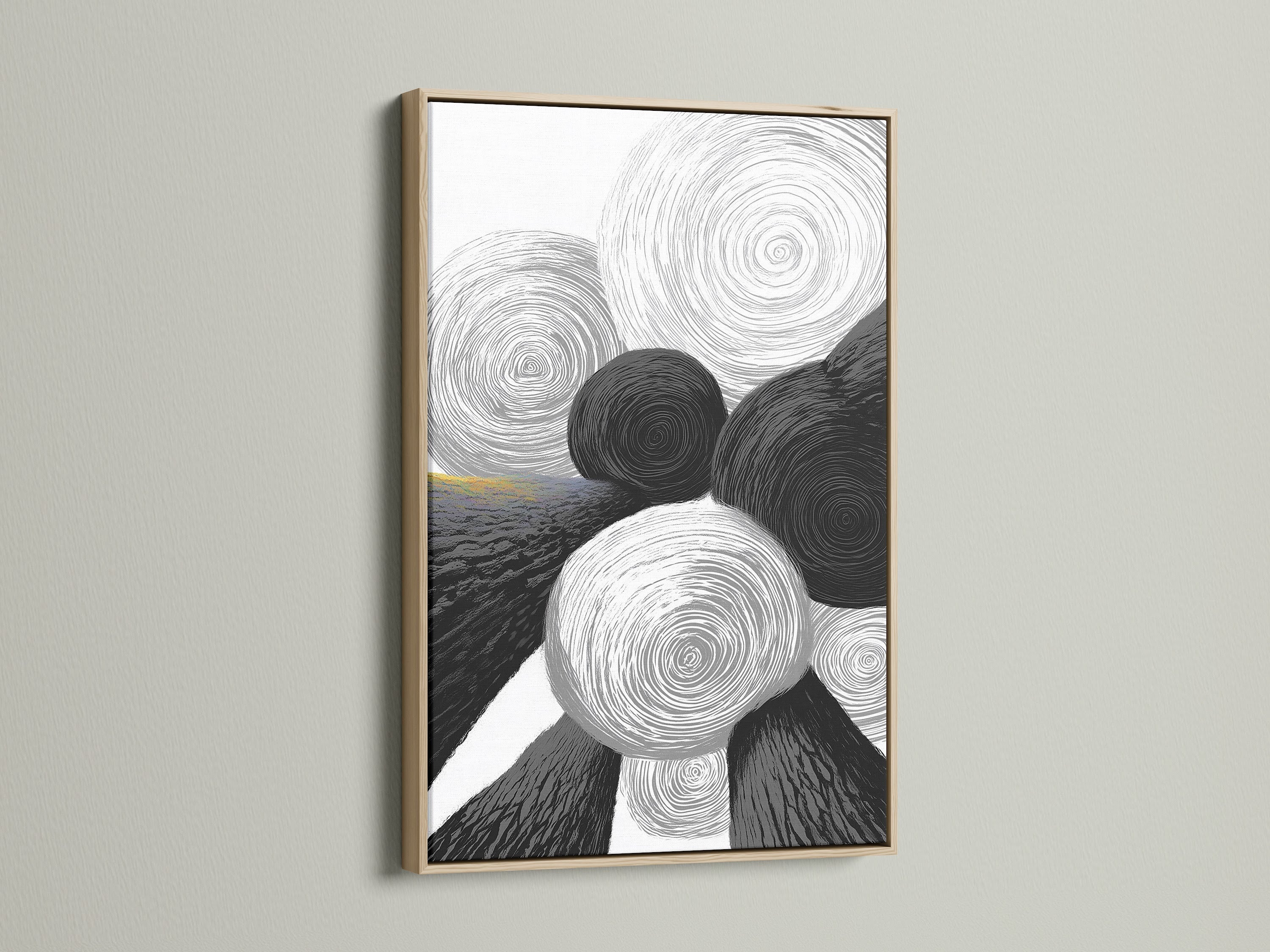 A framed abstract geometric art print. The artwork features black and white circles. The frame is crafted from oak wood. This piece adds a touch of modern minimalist charm to any space. Perfect for living rooms offices or bedrooms.