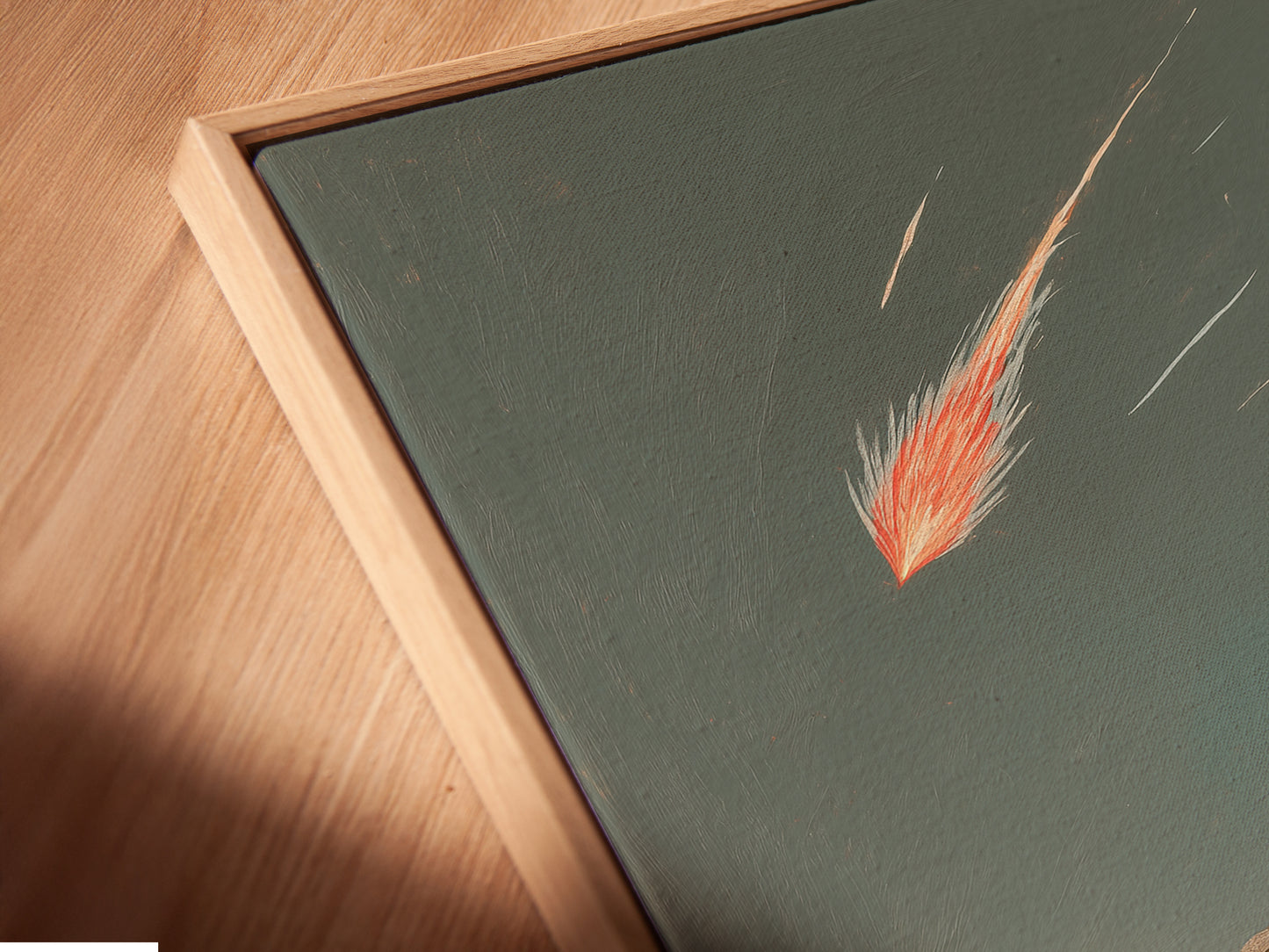 A close-up angled view of a canvas print. The print is displayed in a floating frame. The artwork depicts a person meditating on a hill under a shooting star. The floating frame adds depth and dimension to this celestial artwork.