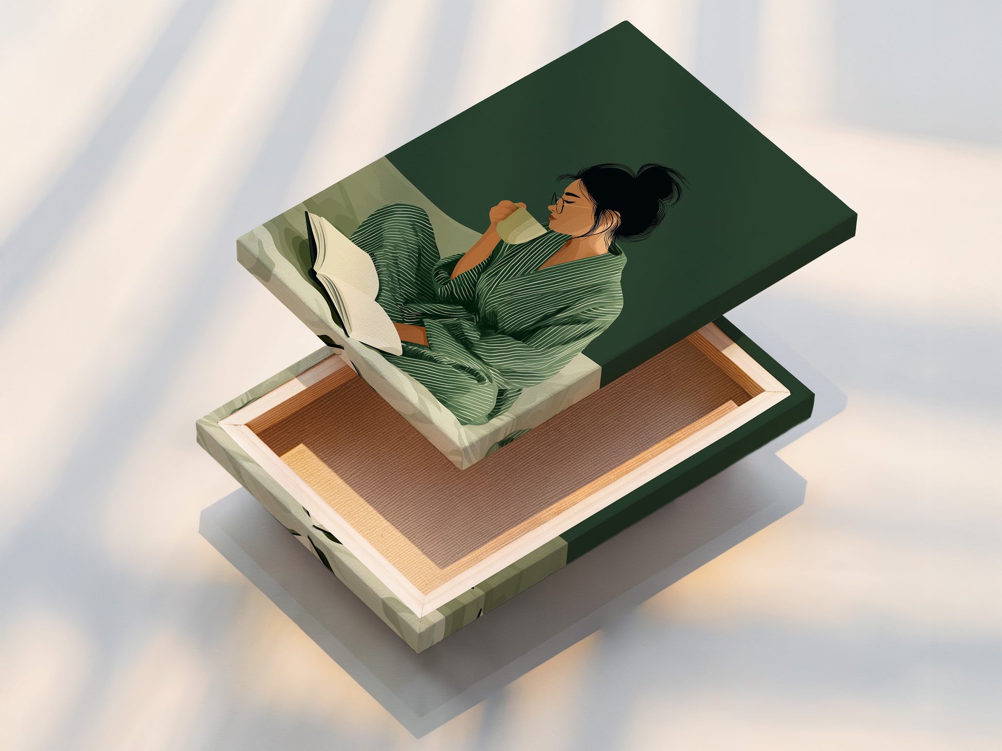 A stretched canvas print of a woman reading. Featuring sage green and beige tones. This contemporary wall decor is ready to hang. A perfect piece for creating a serene atmosphere.