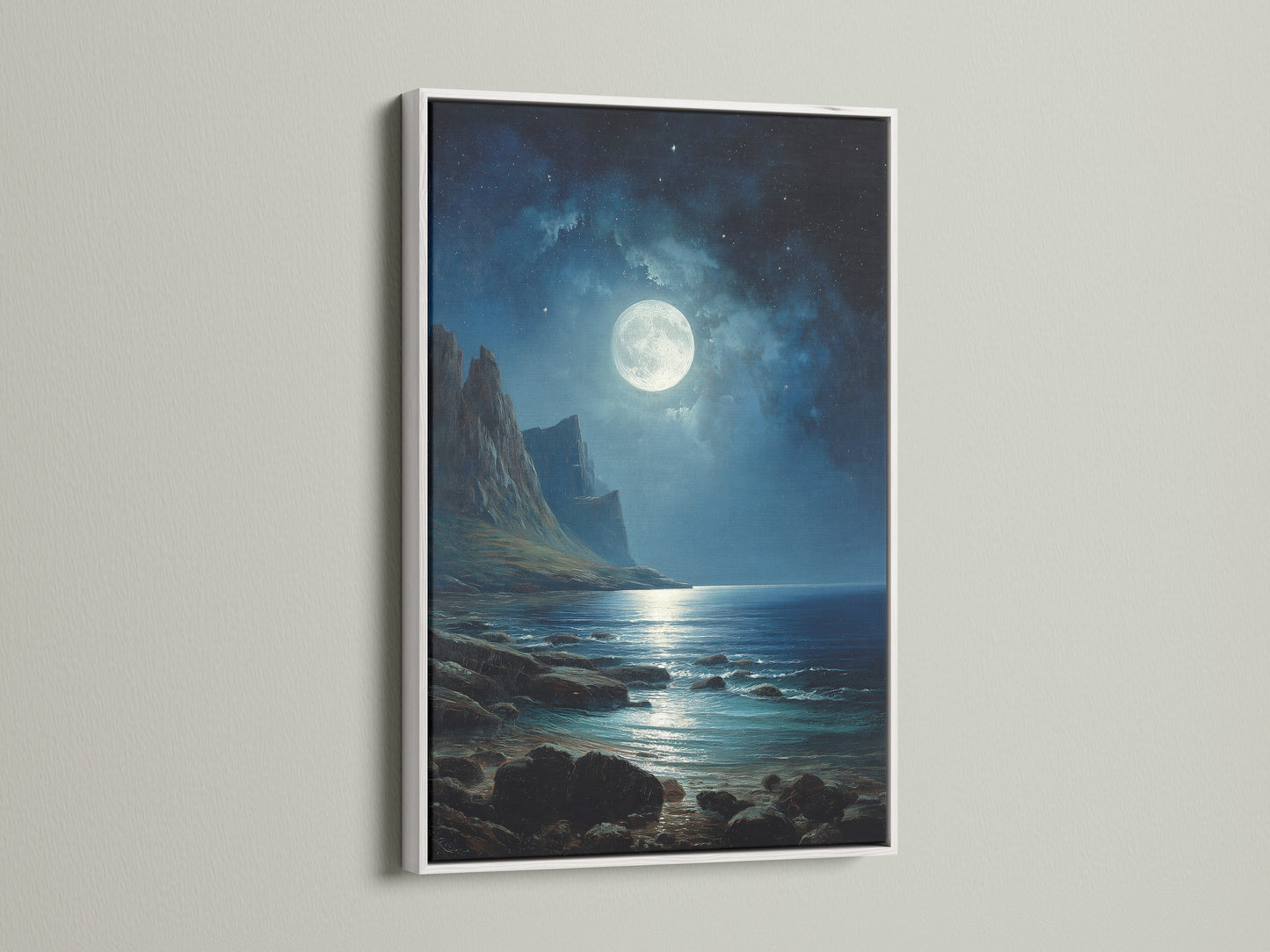 This moonlit seascape artwork is framed in a clean white frame. The contrast between the dark night scene and the bright frame creates a modern look. This framed artwork brings a fresh and airy feel to your space. The white frame complements various interior styles perfectly.
