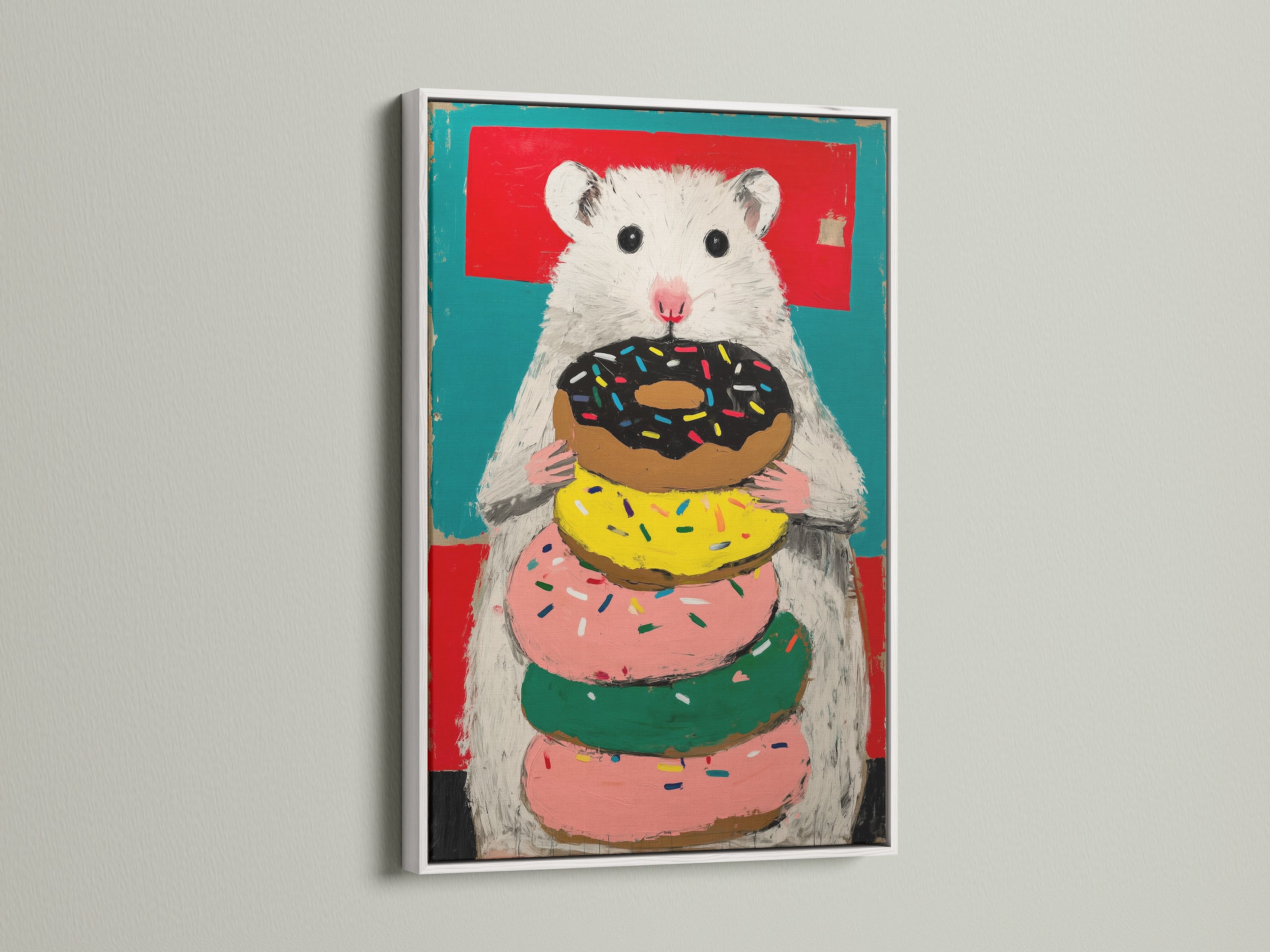 Hamster with Donuts artwork in a white frame. The artwork is a cute animal canvas that is full of color. This is ideal as Kids Room Decor or a unique addition to a pet-themed space.