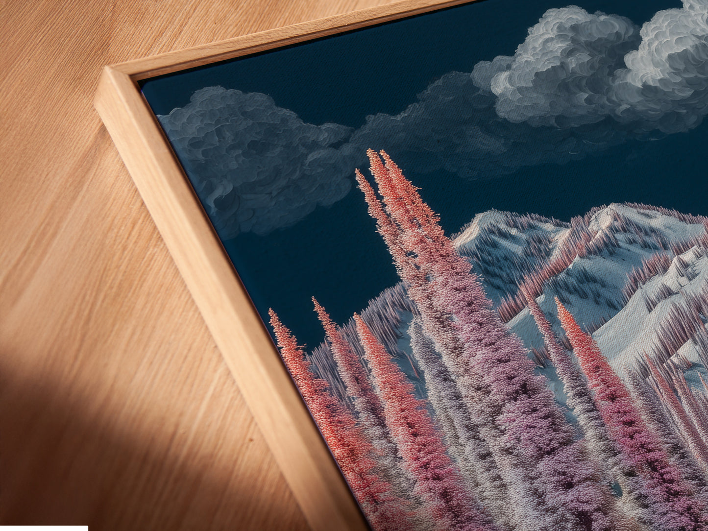 A close-up of a Winter Mountain Canvas Print in a floating frame. The snowy trees wall art is displayed beautifully. The pastel landscape painting appears to float. This frame style adds a modern touch to the artwork. Great for minimalist styles