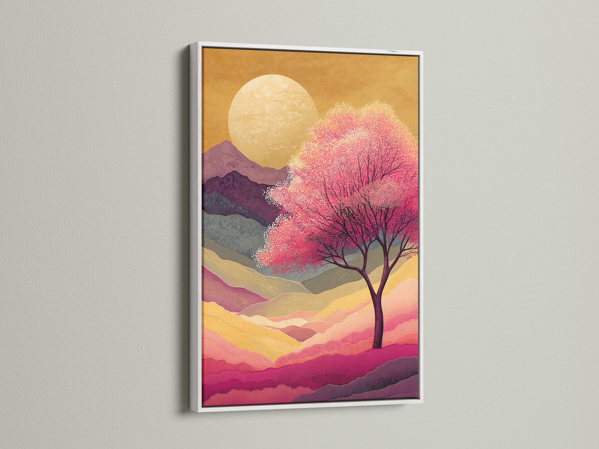 Japanese Cherry Blossom artwork in a white frame. The artwork features a pink sunset mountain landscape. This is zen wall decor for a bedroom. This art brings a peaceful aesthetic. Ideal for minimalist decor styles.