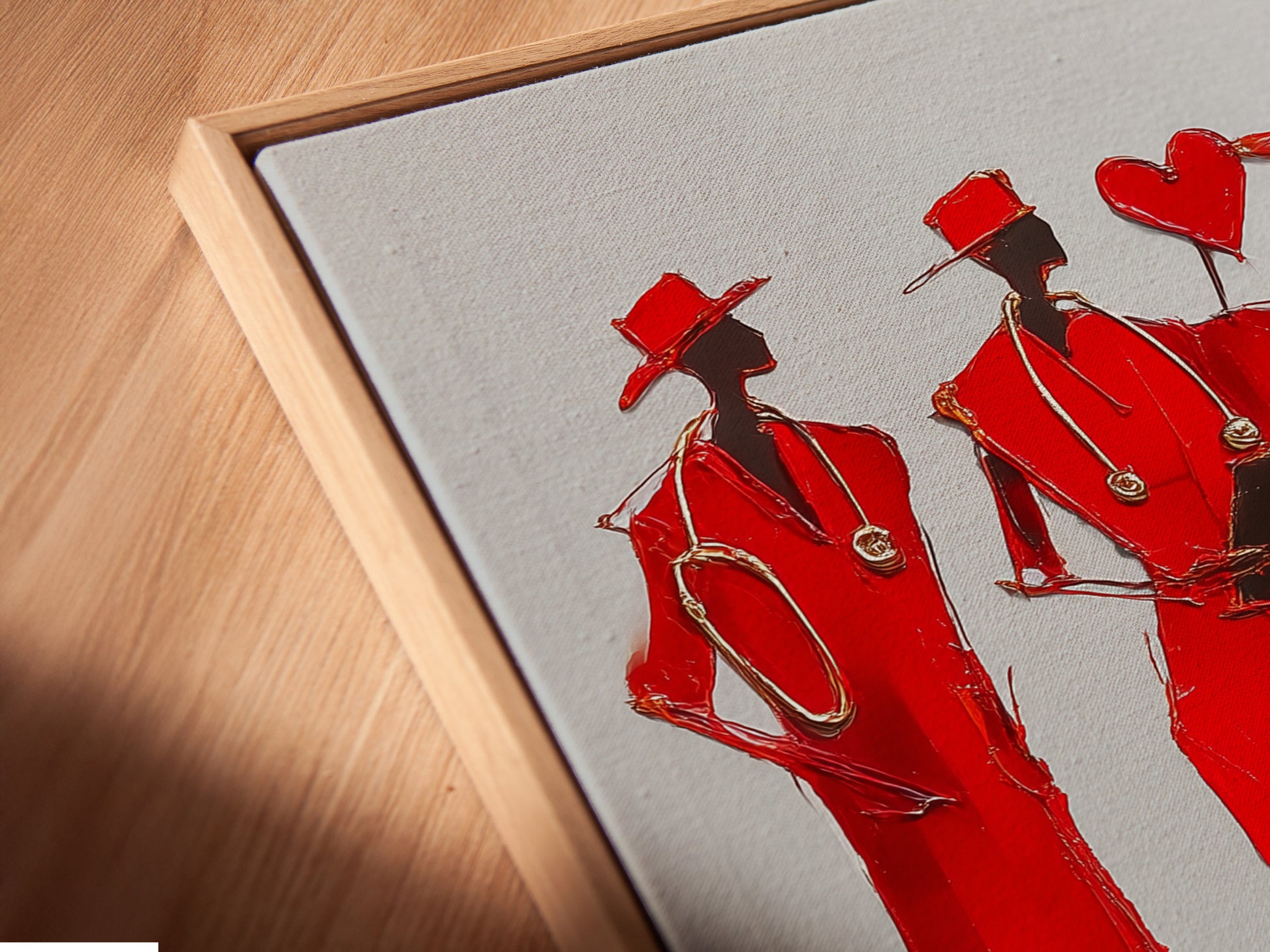 A close-up angled view of a canvas print in a floating frame. The artwork is a Red Fashion Sketch Art. This contemporary figure drawing enhances clinic wall art and office wall decor.