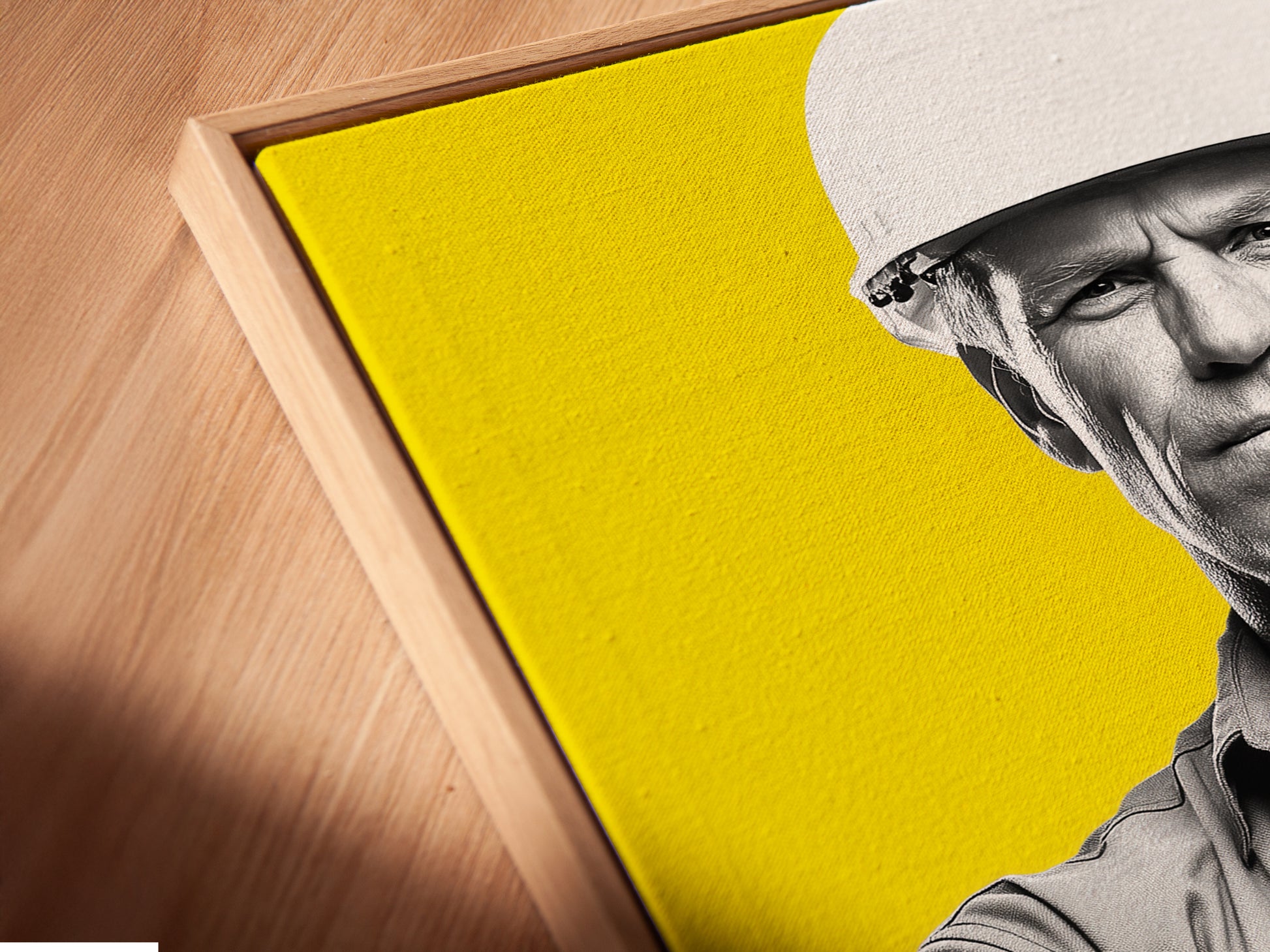 Close up of a canvas print in a floating frame. The Construction Worker artwork is an architect print. It is a perfect gift for engineers. This modern canvas art is yellow wall art. It is great for office wall decor. This worker artwork is building art.