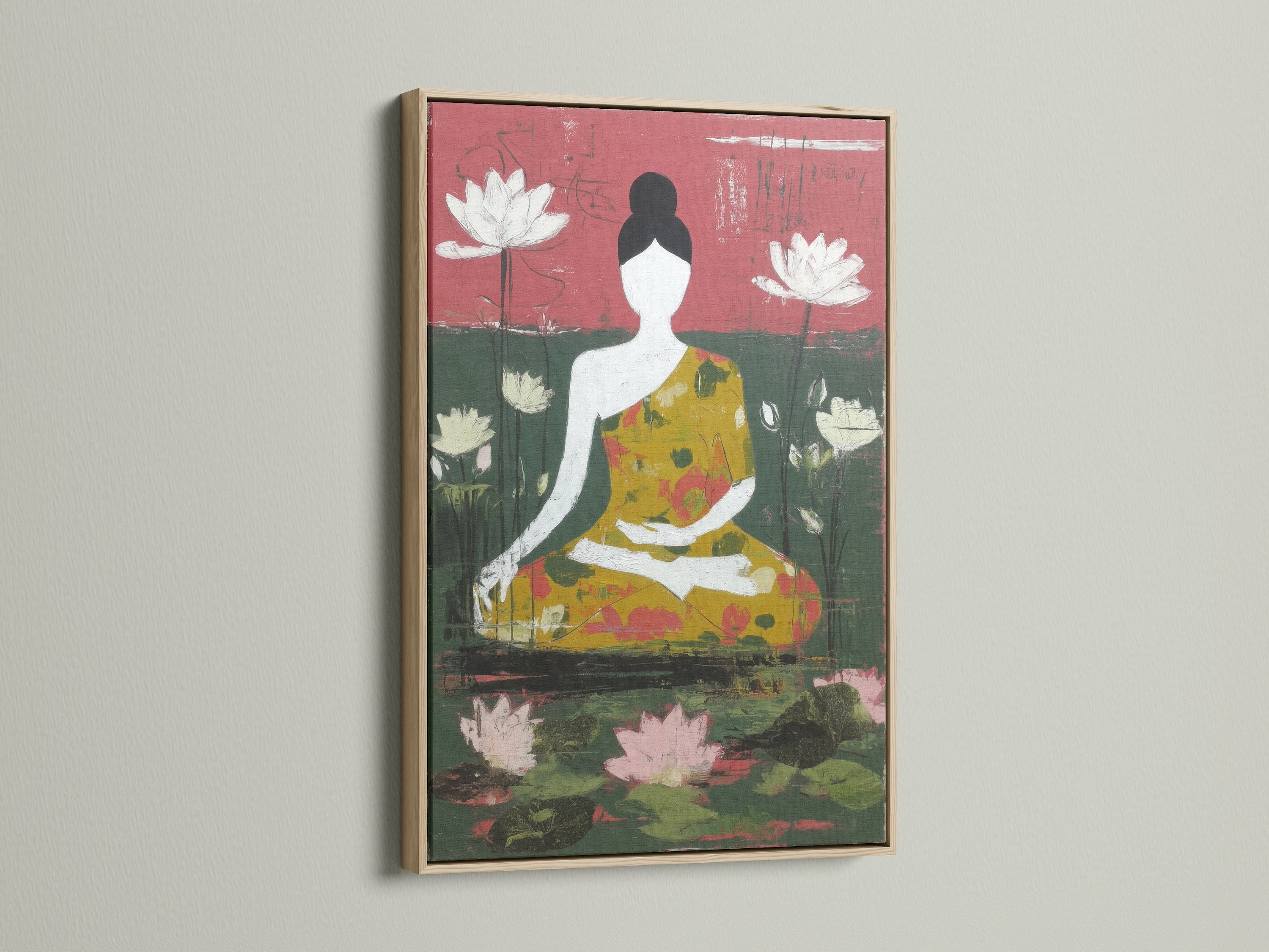 A framed meditation art piece with an oak frame hangs on a white wall. The artwork shows a seated Buddha amidst lotus blossoms. The print adds a touch of zen home decor to minimalist Scandinavian or eclectic spaces. Ideal for meditation rooms and wellness centers.