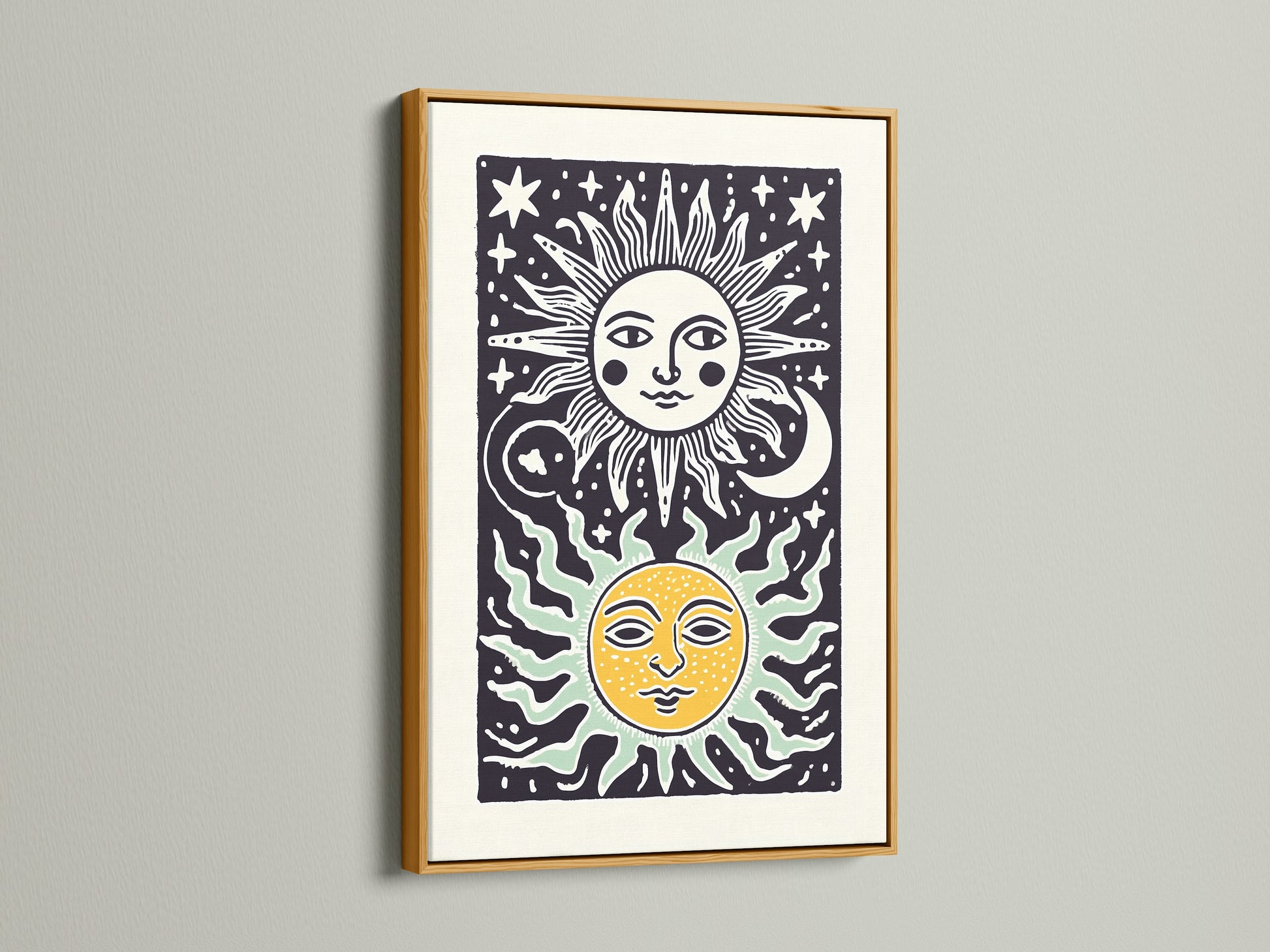 Gold frame enhances sun and moon art. The frame provides a luxurious touch. The artwork is displayed on a white wall. It creates an elegant and sophisticated look. The gold frame complements the artwork. The art is a great addition.