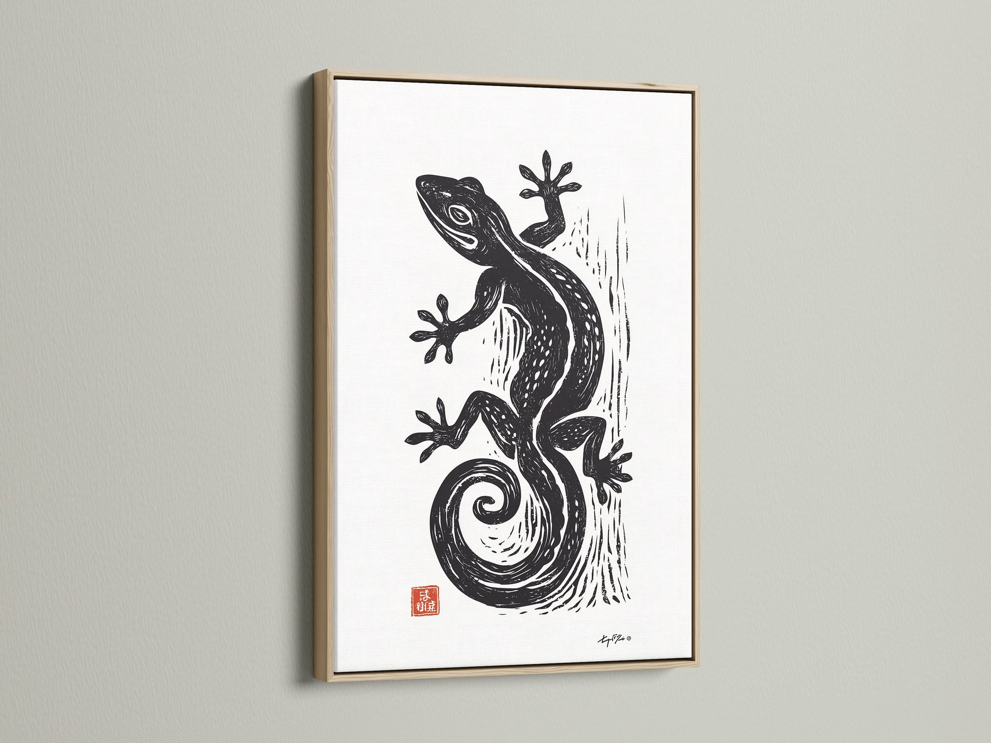 Oak frame enhances this wall art. The art has a white matte. A black gecko artwork is displayed. The frame gives it a gallery-ready appearance. This framed art is ready to hang and enjoy in your space.