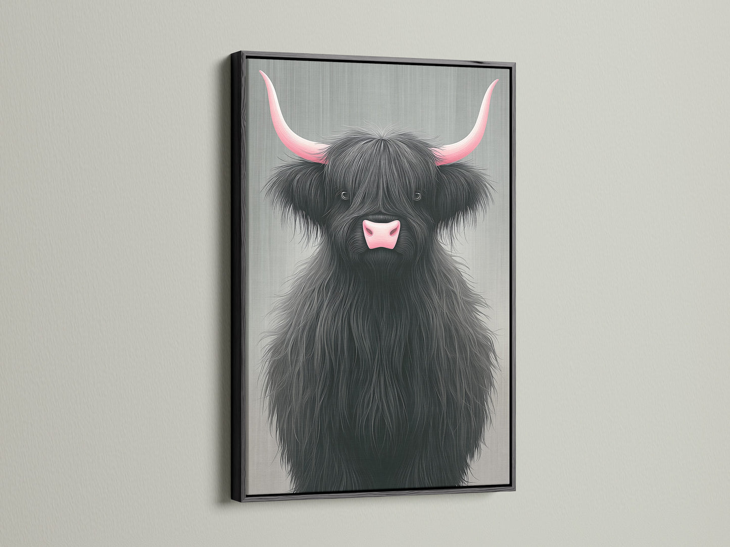 Highland Cow canvas print with pink horns in a black frame. This striking animal wall decor adds a contemporary touch to your space. The black frame makes the artwork pop. Ideal for farmhouse or modern interiors. A unique cow artwork.