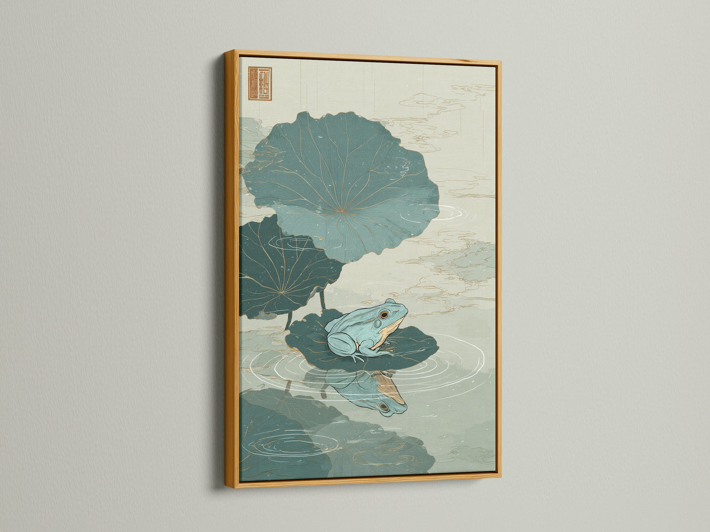 Artwork featuring a green frog sitting on a lily pad in a gold frame. The gold frame brings a touch of luxury and glamour. This framed artwork is a perfect accent for any room. Add a touch of elegance to your home. Find the perfect framed artwork for your style.