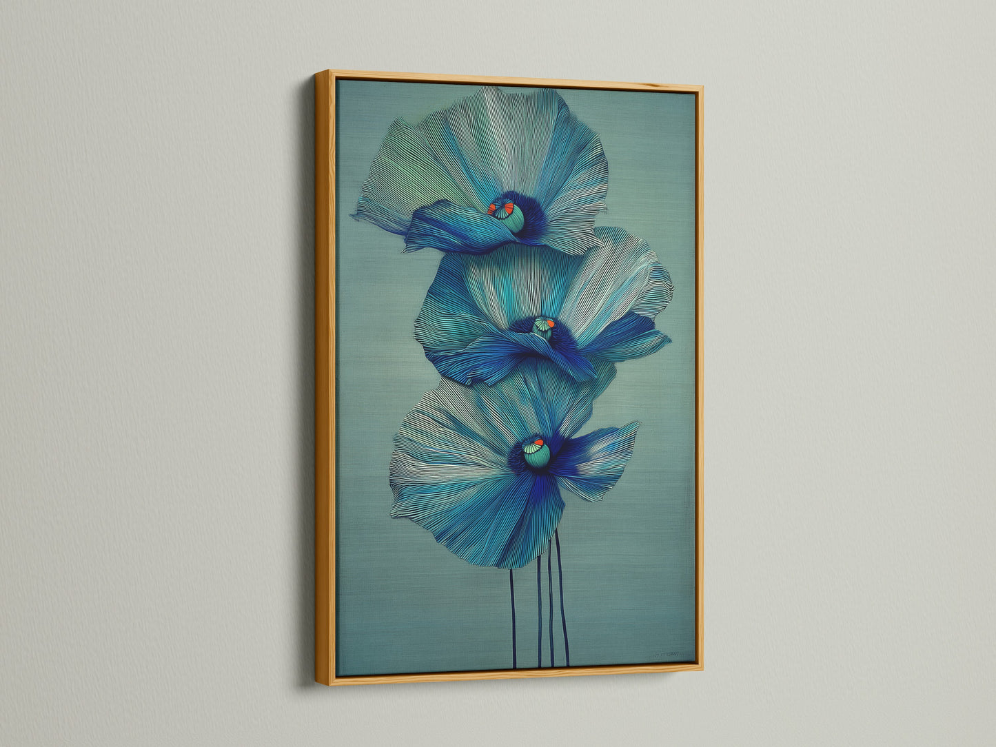 A stunning blue flower artwork is displayed in a gold frame. This floral canvas print adds a touch of luxury to your decor. Browse our selection of modern art prints. Perfect for bedroom wall decor and scandi decor.