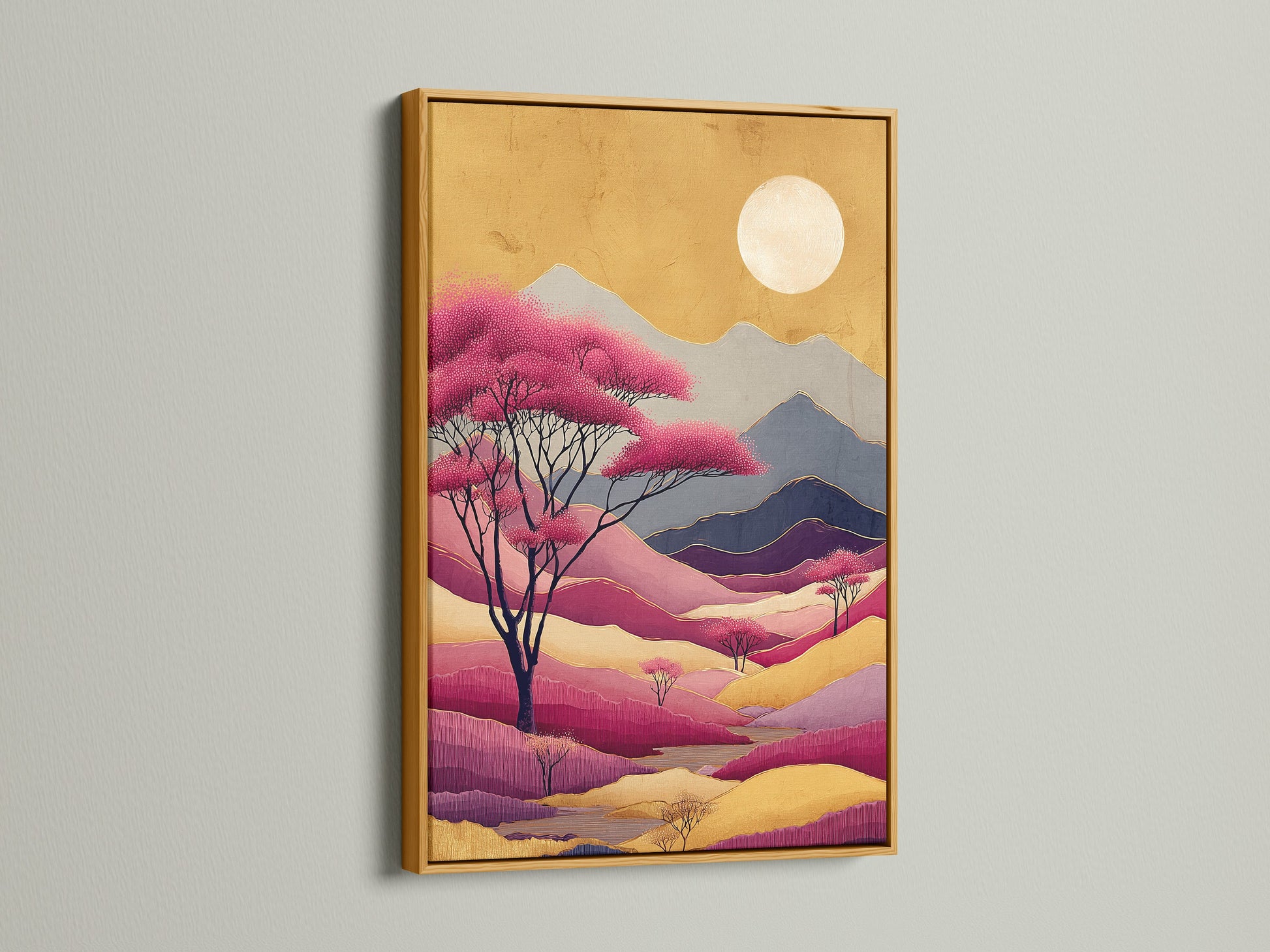 Gold frame featuring abstract mountain artwork. The sunset landscape is a colorful addition to your walls. This modern nature artwork is ideal for bedroom decor. The geometric mountain design adds a touch of elegance. It is best for contemporary rooms.